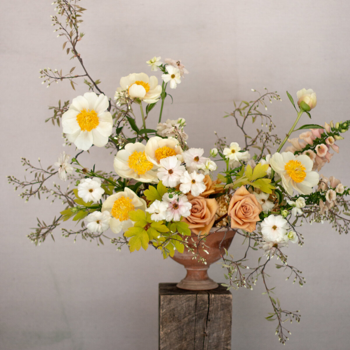 An elegant arrangement of pastel garden flowers at a Montreal wedding.