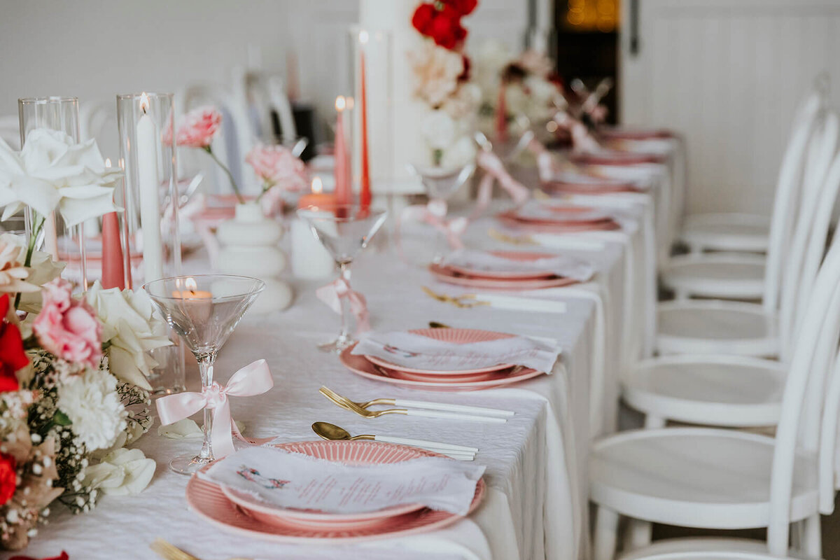 Romantic pink & red wedding table flowers Flaxton Gardens