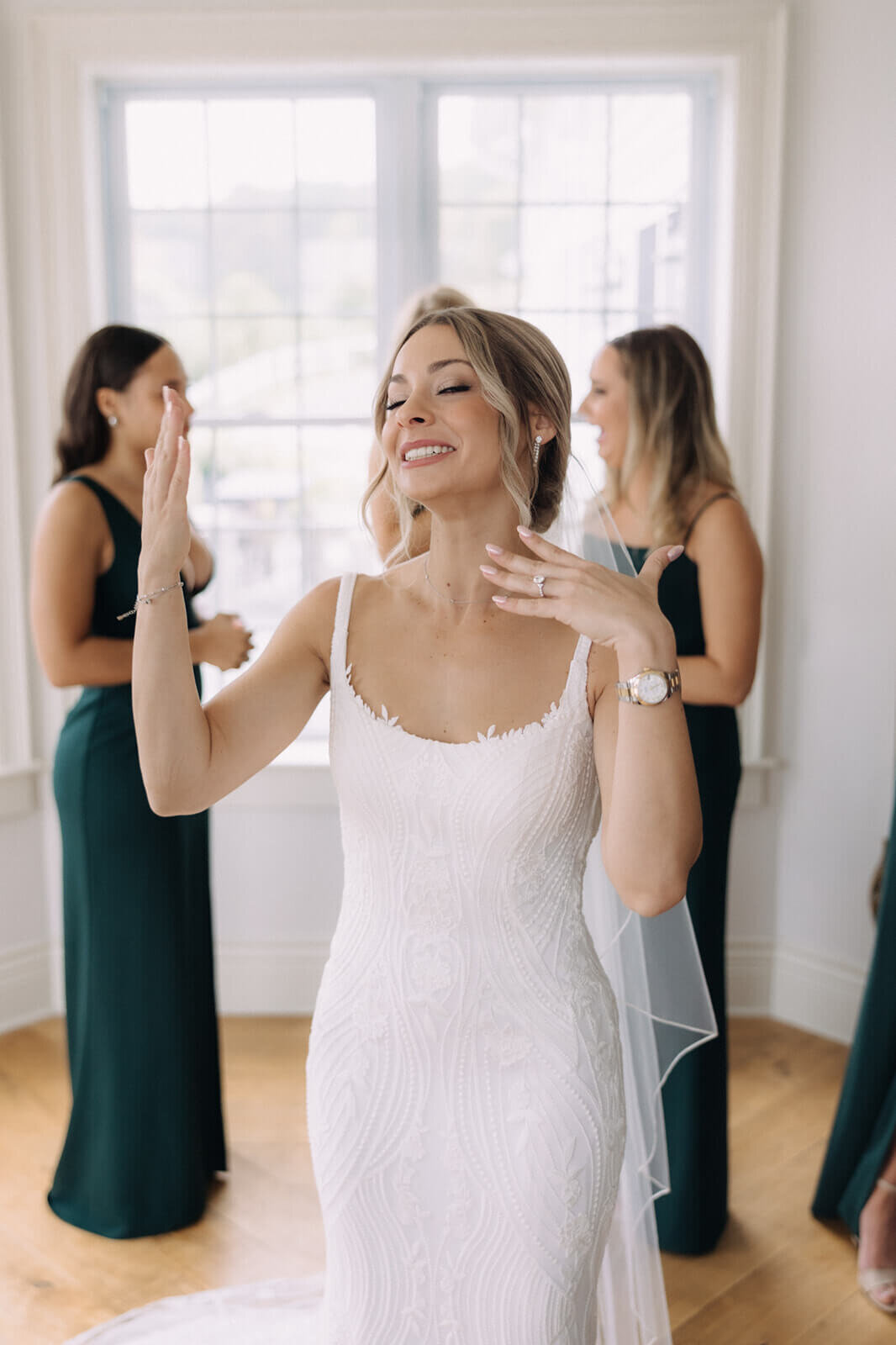 Bride surrounded by bridesmaids