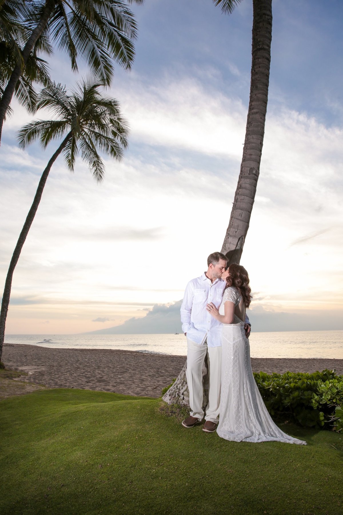 Maui Wedding Photography   at The Westin Maui Resort and Spa  with the bride and groom at sunset