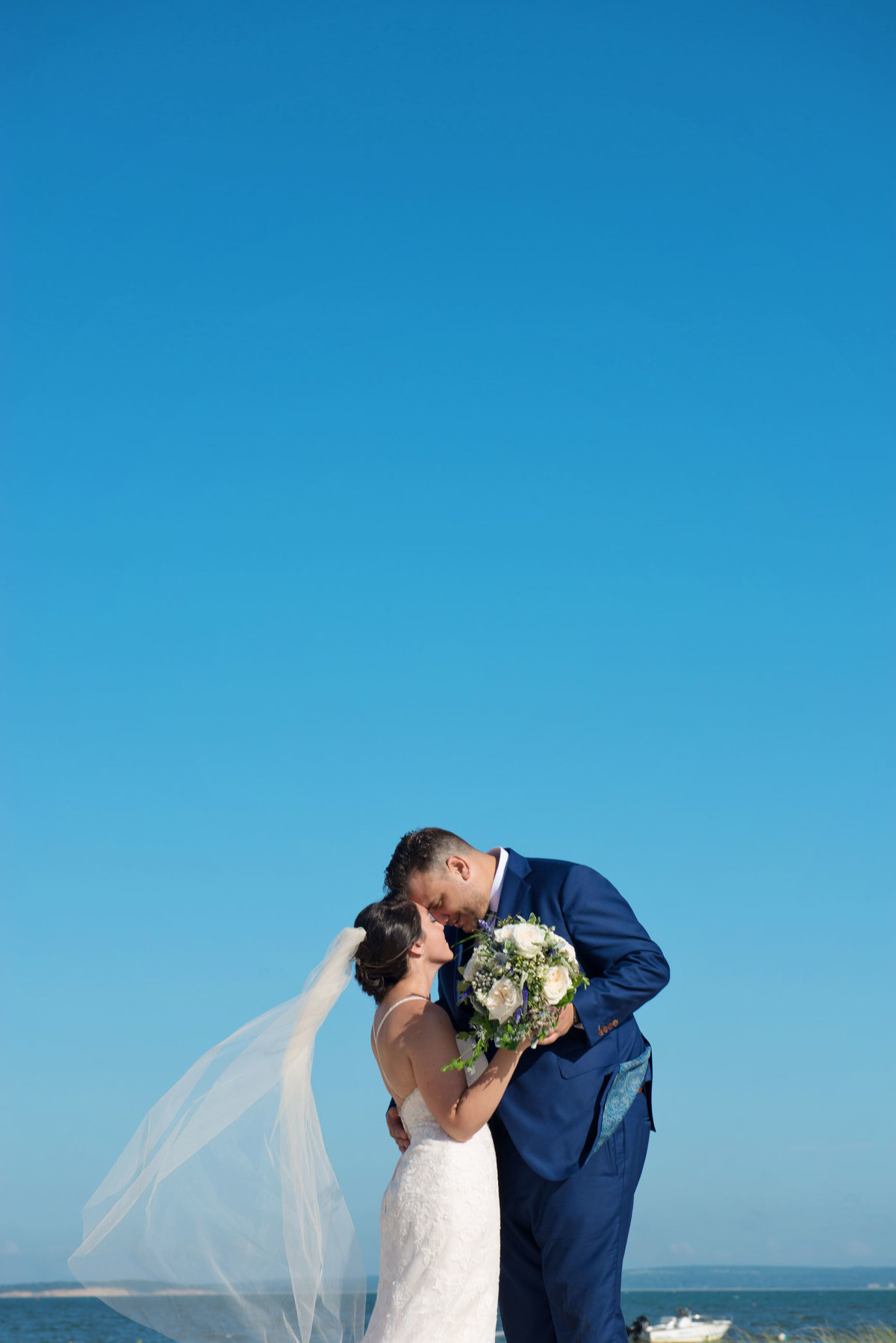 Bride and groom beach photo