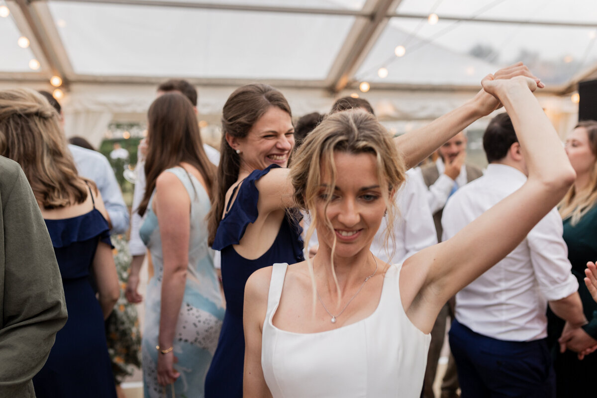 Ceilidh dancing at Devon marquee wedding