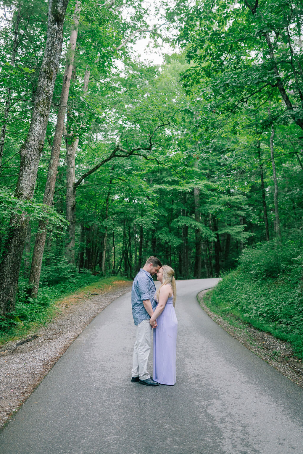 Sacramento Wedding Photographers capture couple hugging in forest