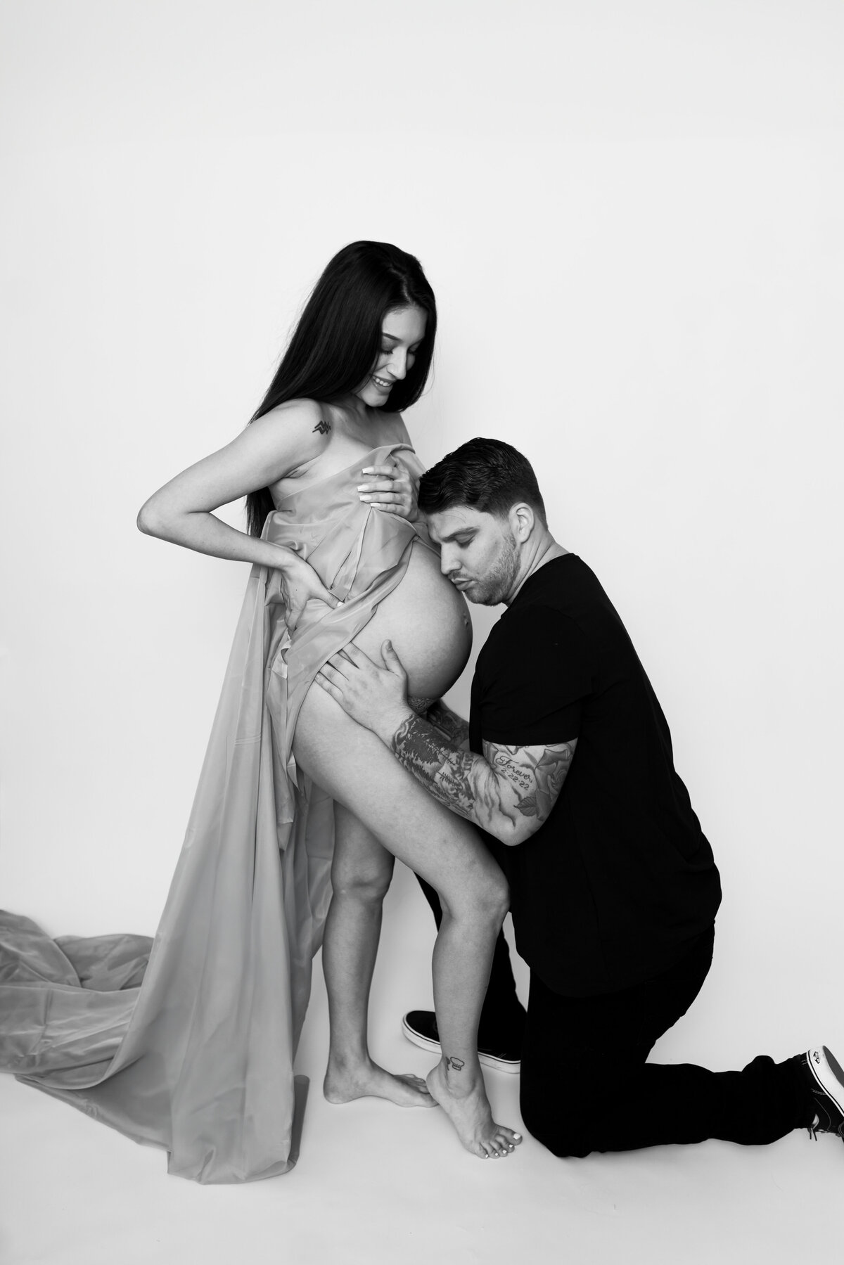 Austin Texas Maternity Studio Photo of Woman with drape.