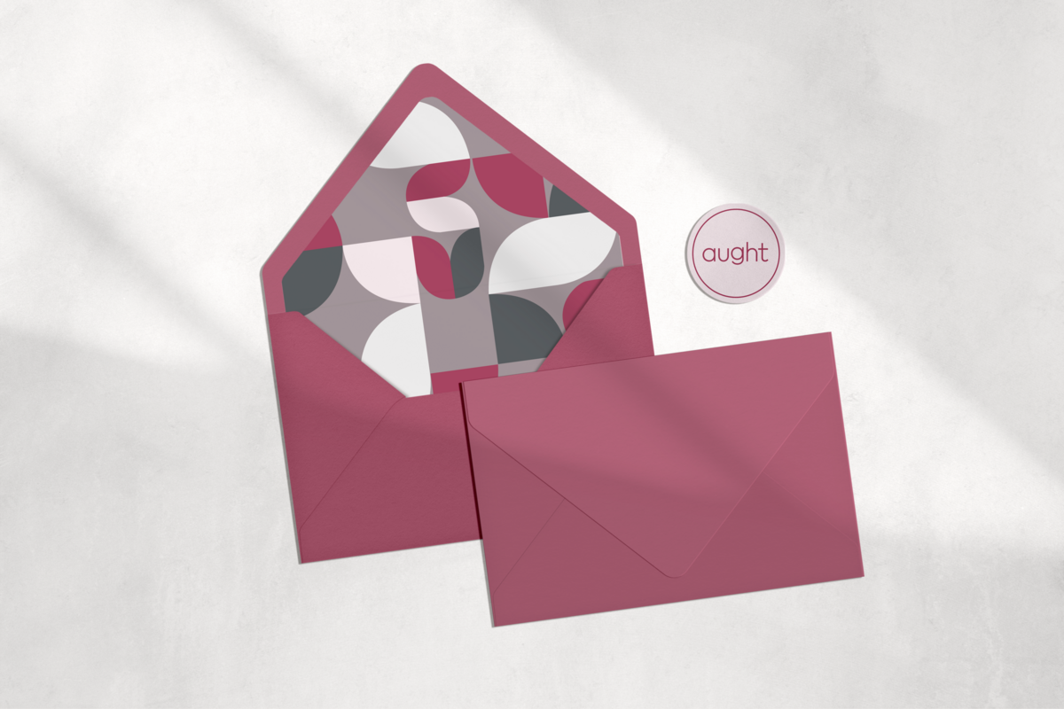 Brand identity mockup of custom-branded envelope, mauve-colored envelope with geometric brand pattern insert and logo sticker