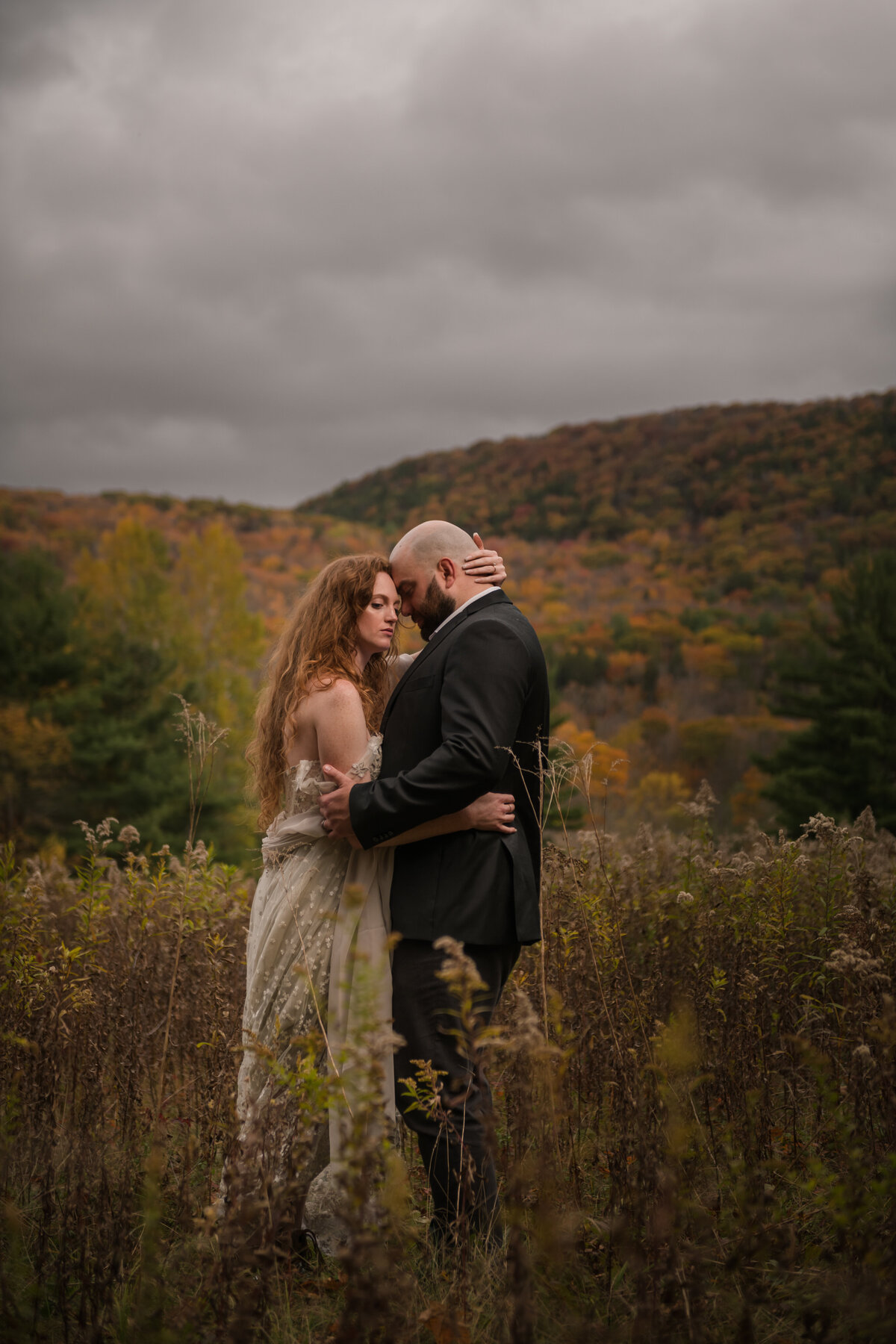 bride and groom embracing during couples portraits
