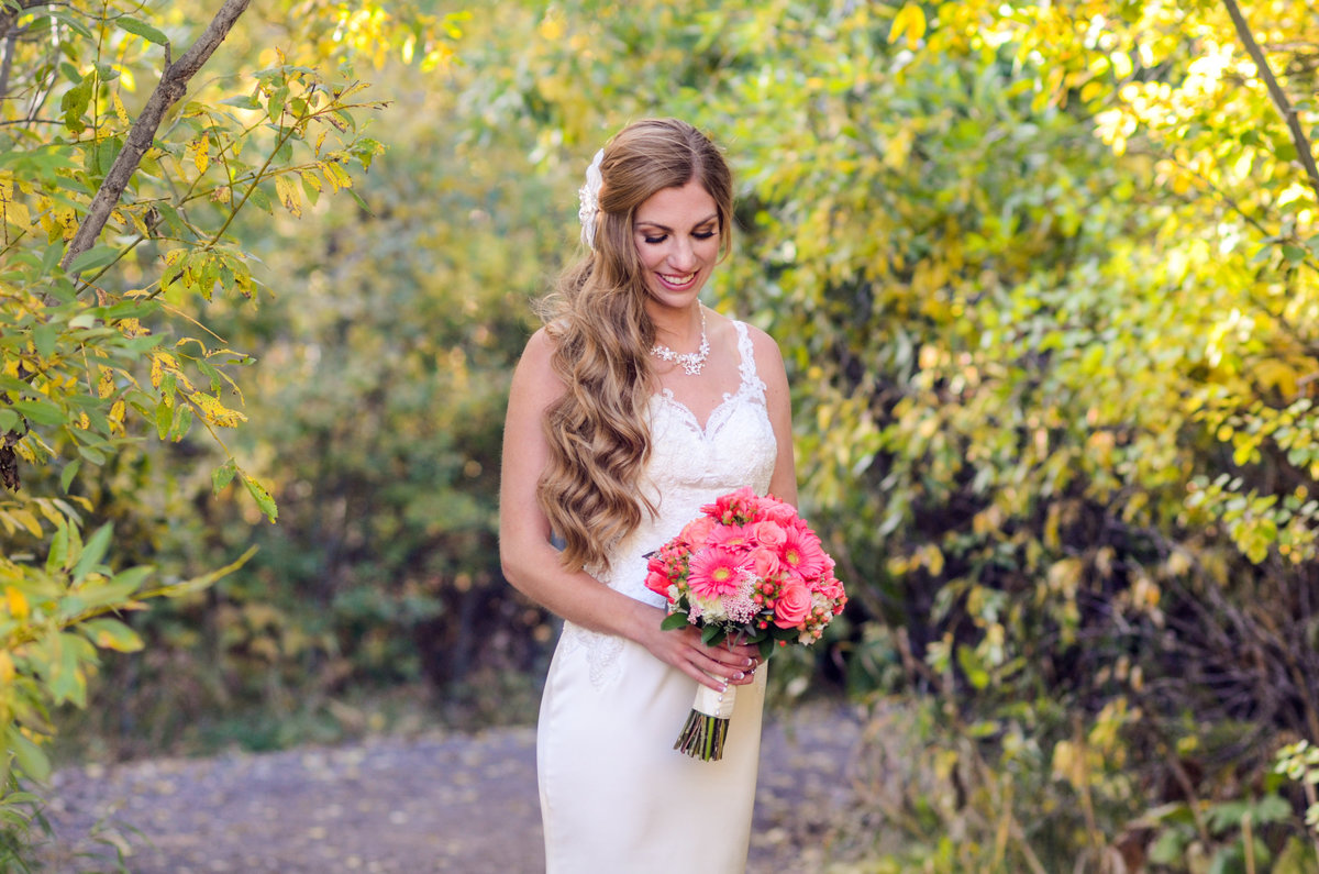 Bride holding bright bouquet