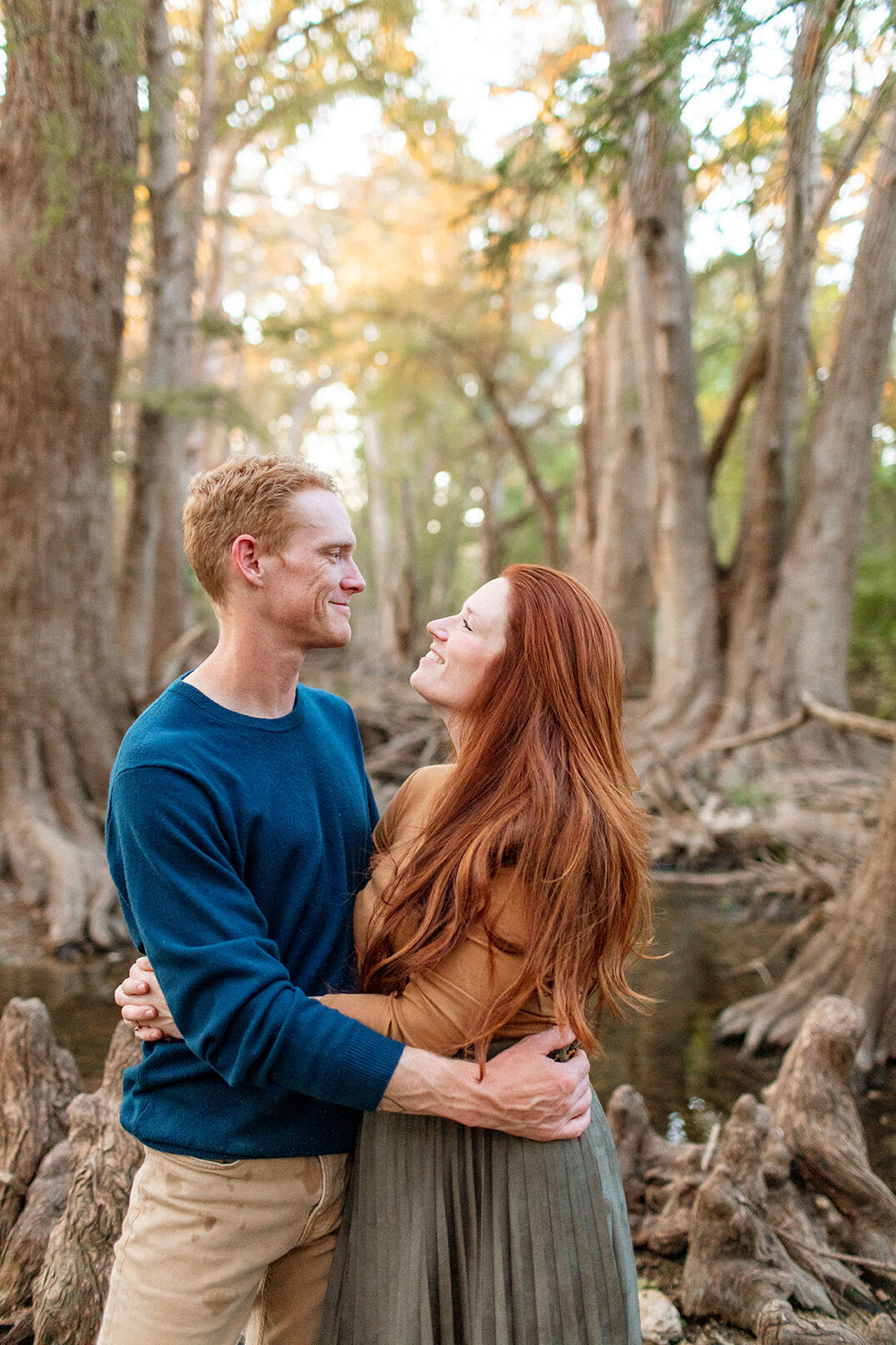 Portrait of a couple outdoors in beautiful natural light, photographed by Sara James in San Antonio.