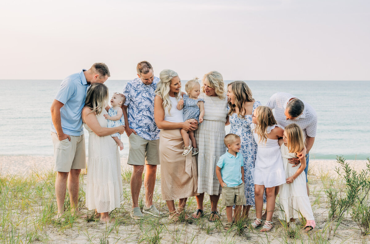 Family posing for lifestyle photography session in Northern Michigan