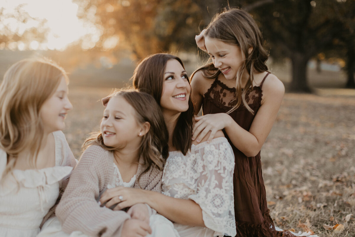 Mom and 2 daughters in a candid moment.