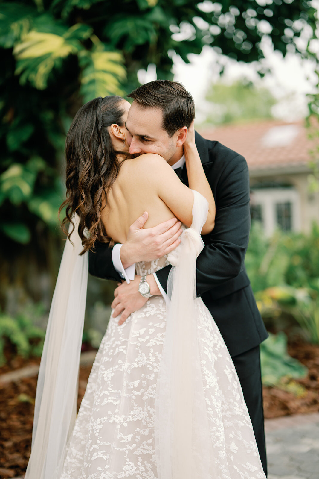 Bride and groom hugging at Shangri-La Springs wedding