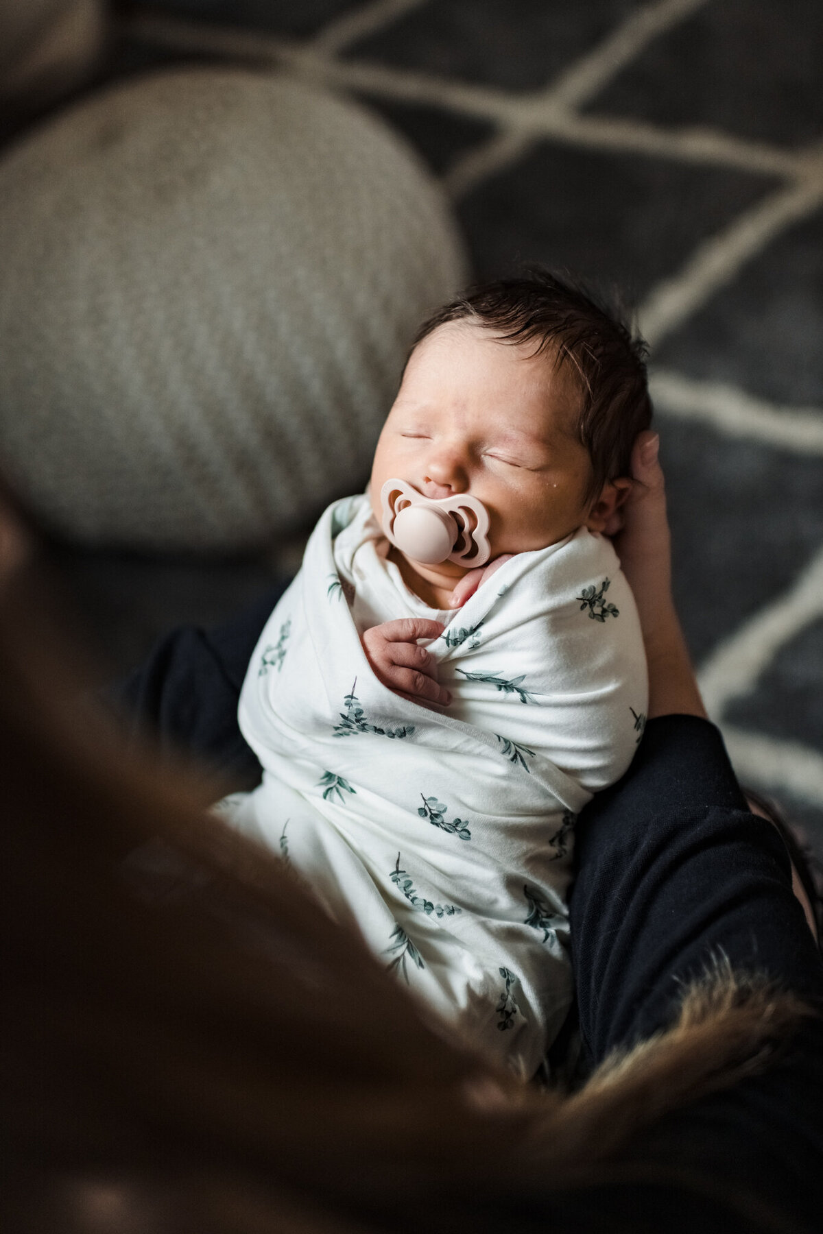 baby girl newborn photography swaddled in hands