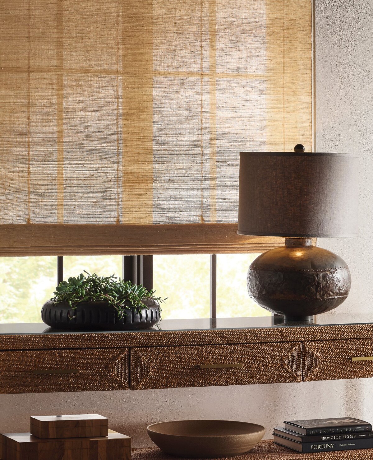 Hartmann & Forbes natural woven shade above a console, lifestyle photo