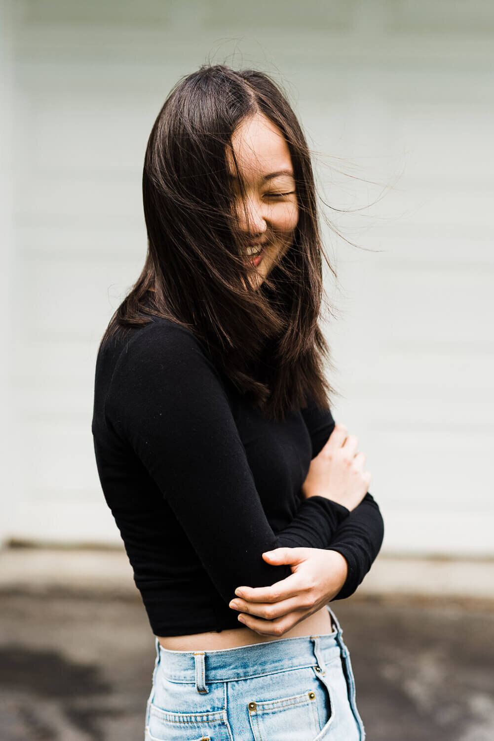 Woman laughing.