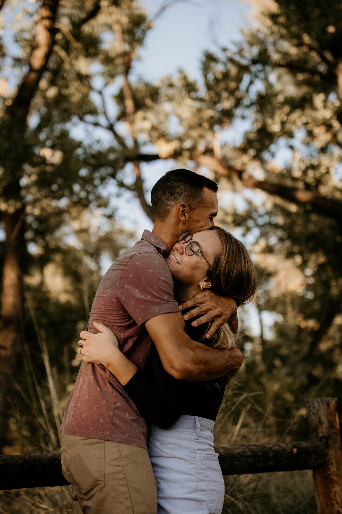 engaged couple hugging each other