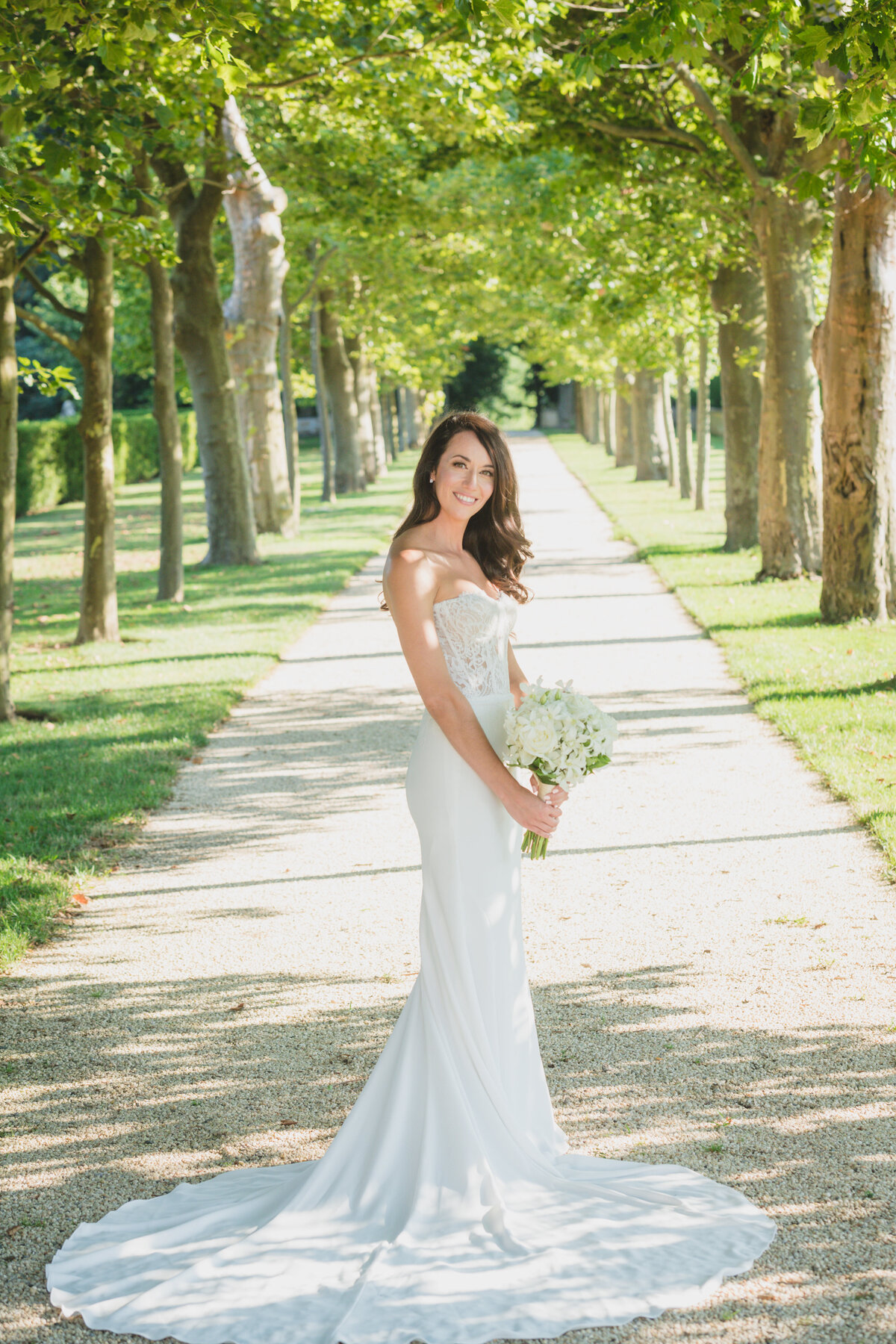 stunning bride standing outside Oheka Castle