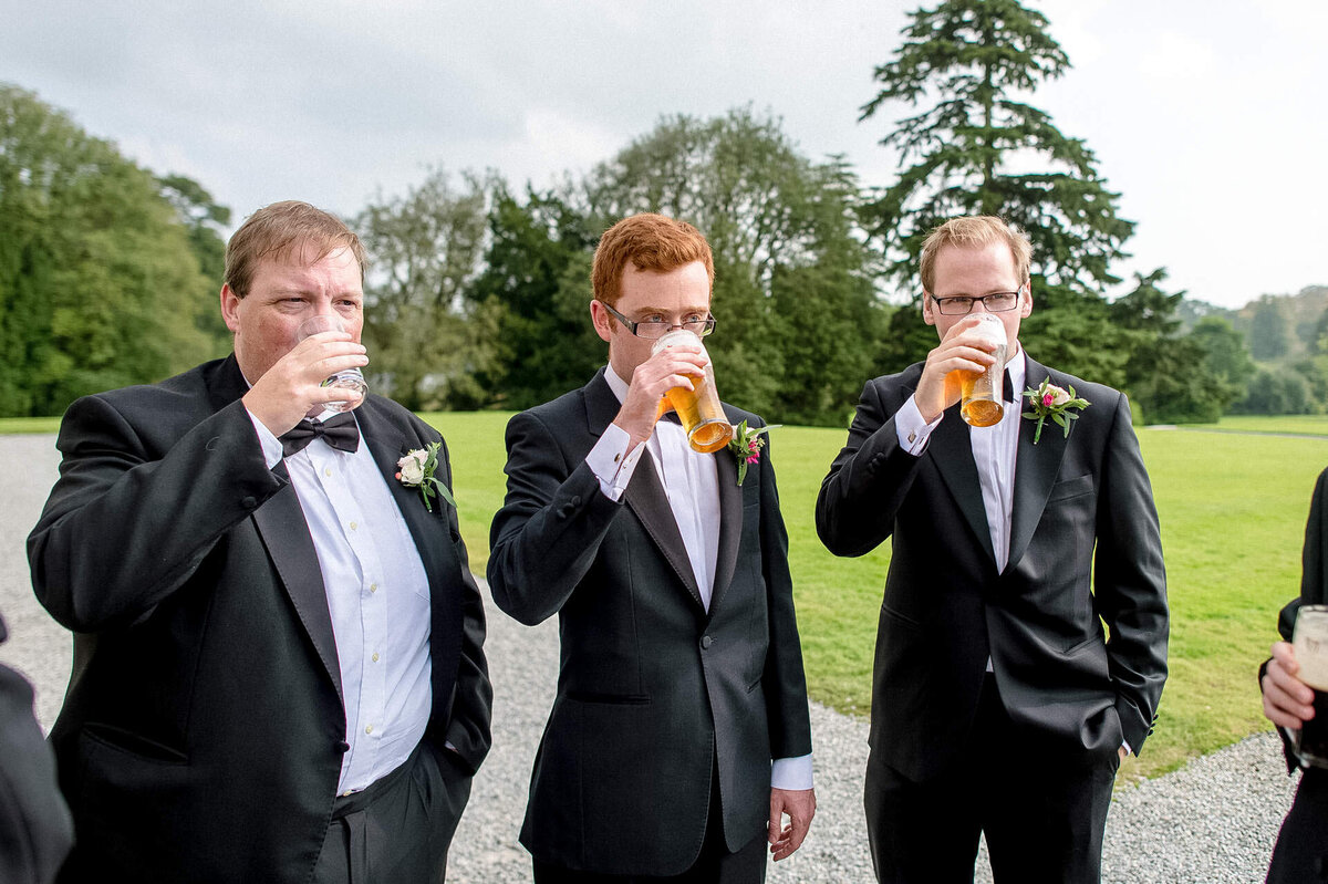158 three-groomsmen-drinking