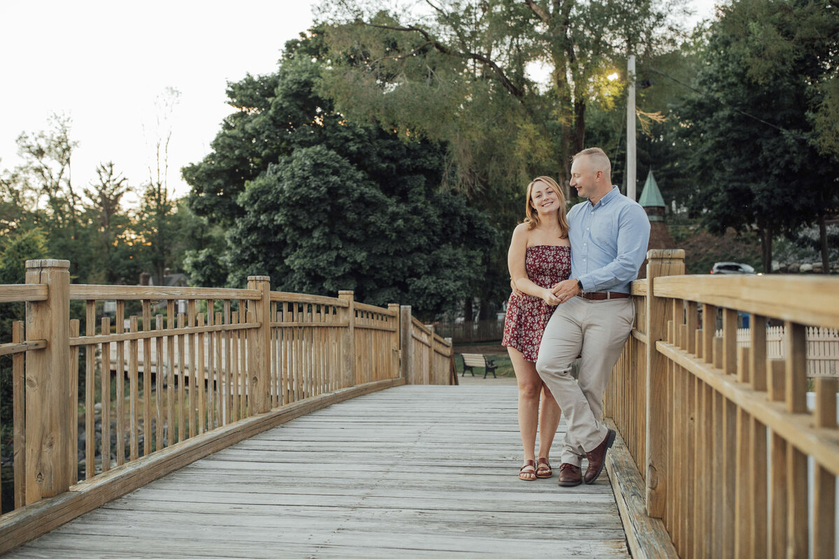 Proposal Photographer | Groom-to-be proposing by the water at Lake Sparta during golden hour | Sparta, New Jersey