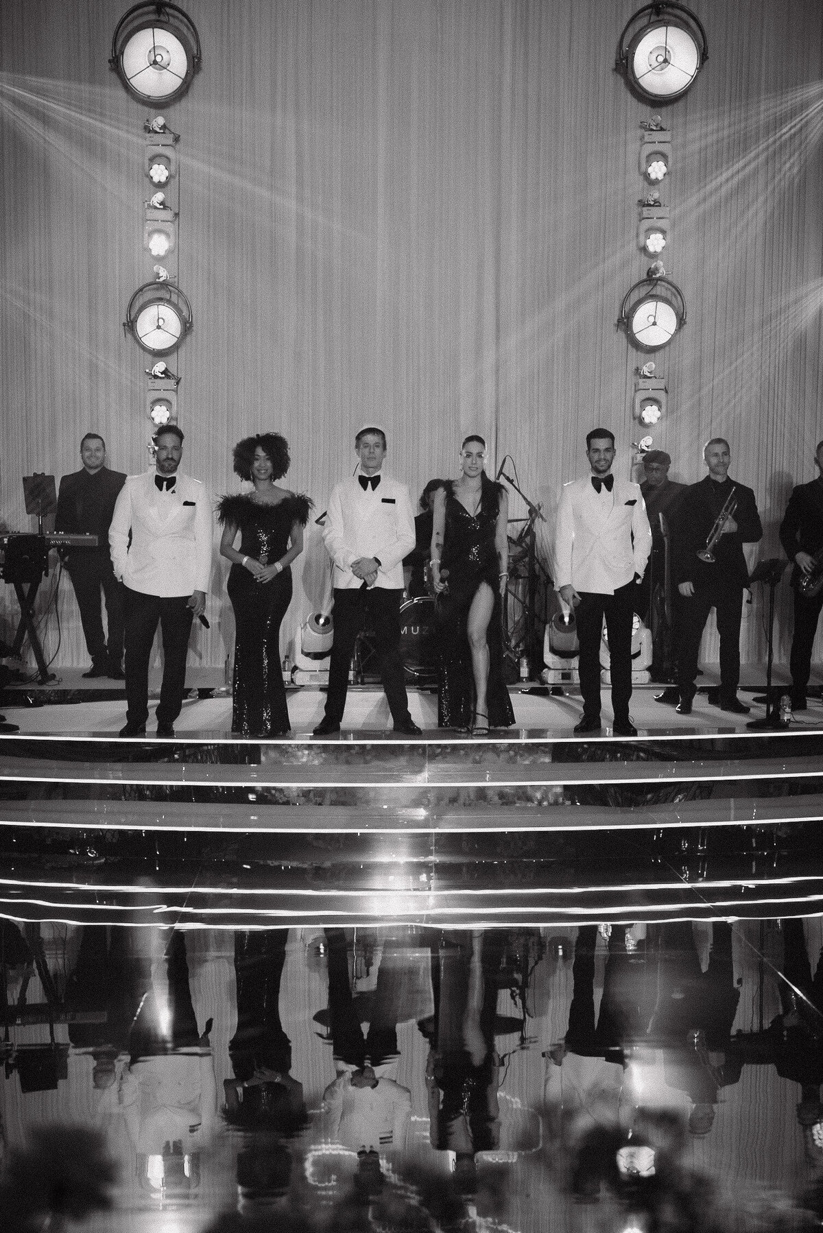 Wedding photographer captures couple taking a stroll hand in hand at their french chateau wedding.