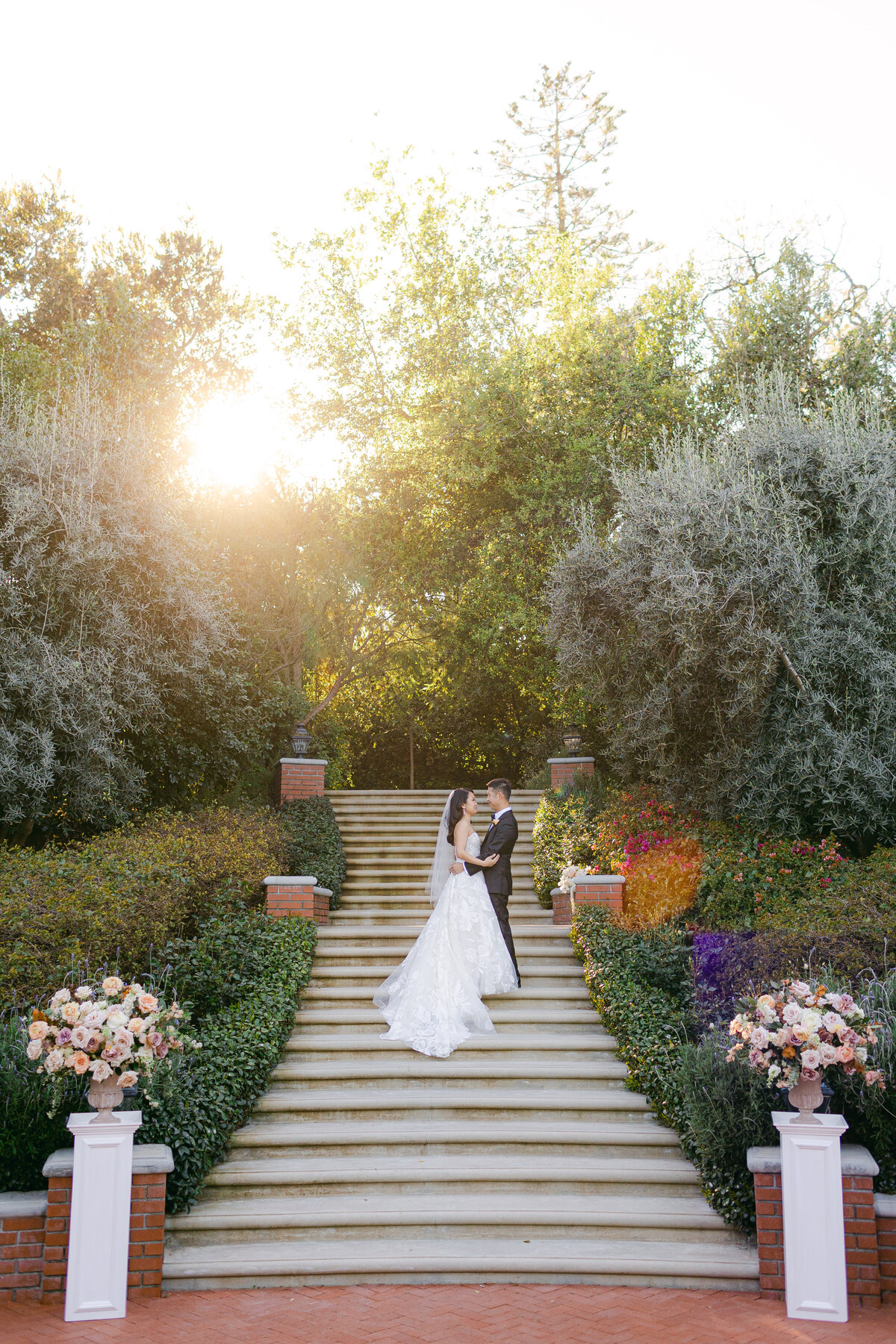 Bride and groom on stairs in Los Angeles