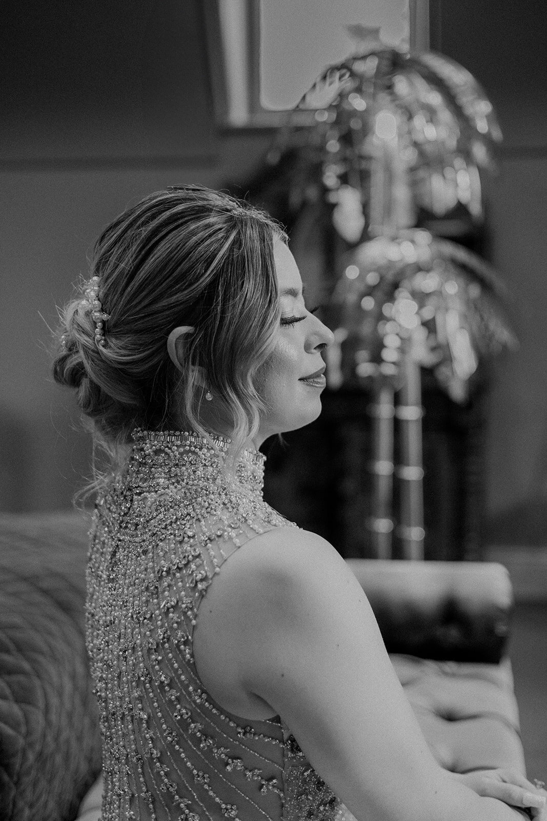 Black and white side portrait of bride