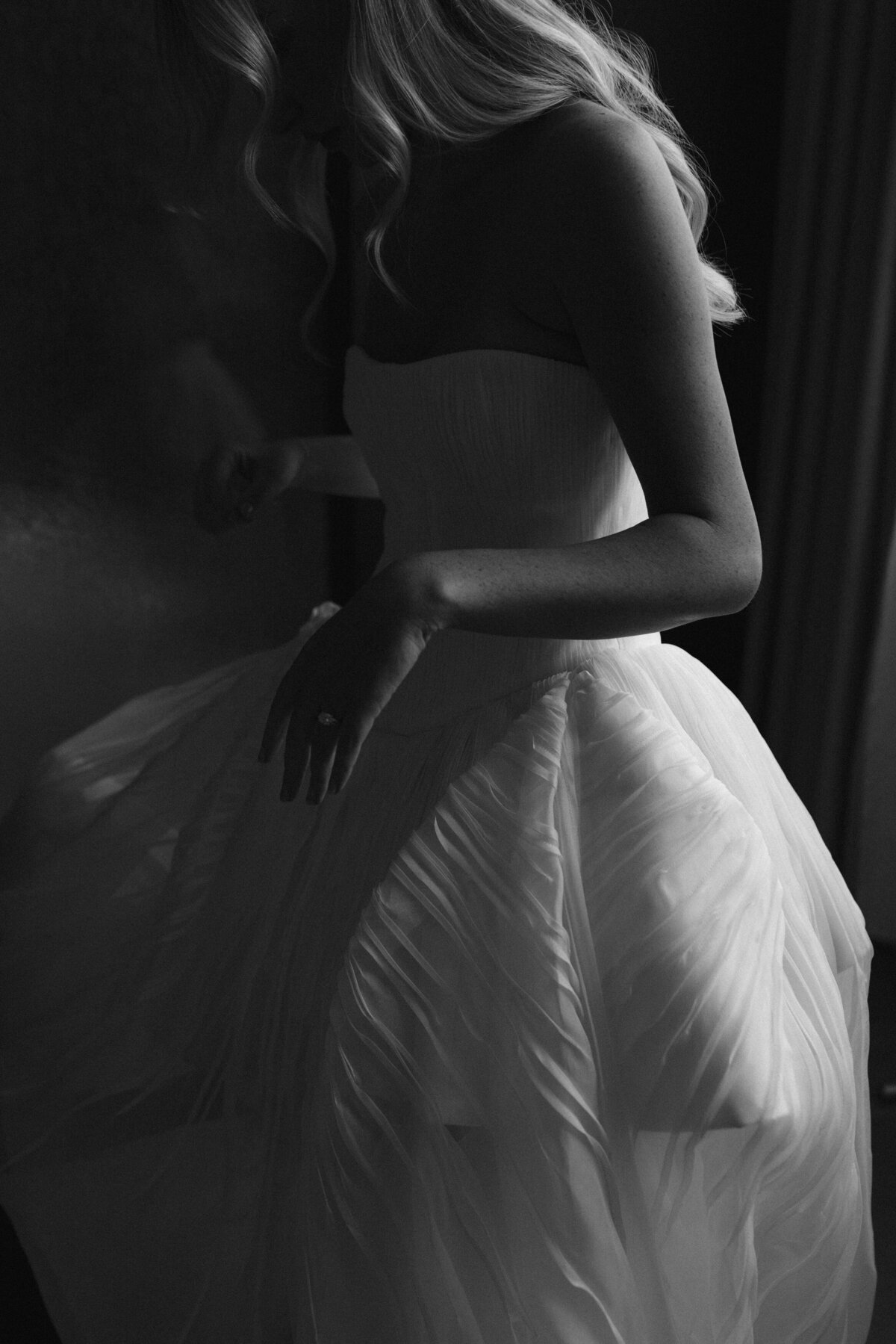 Fashion forward editorial wedding photography at NOBU Hotel Chicago showcases Lauren Alatriste's signature style, combining luxury wedding preparation with timeless film photography creating magazine-worthy bridal imagery with authentic
emotion.
