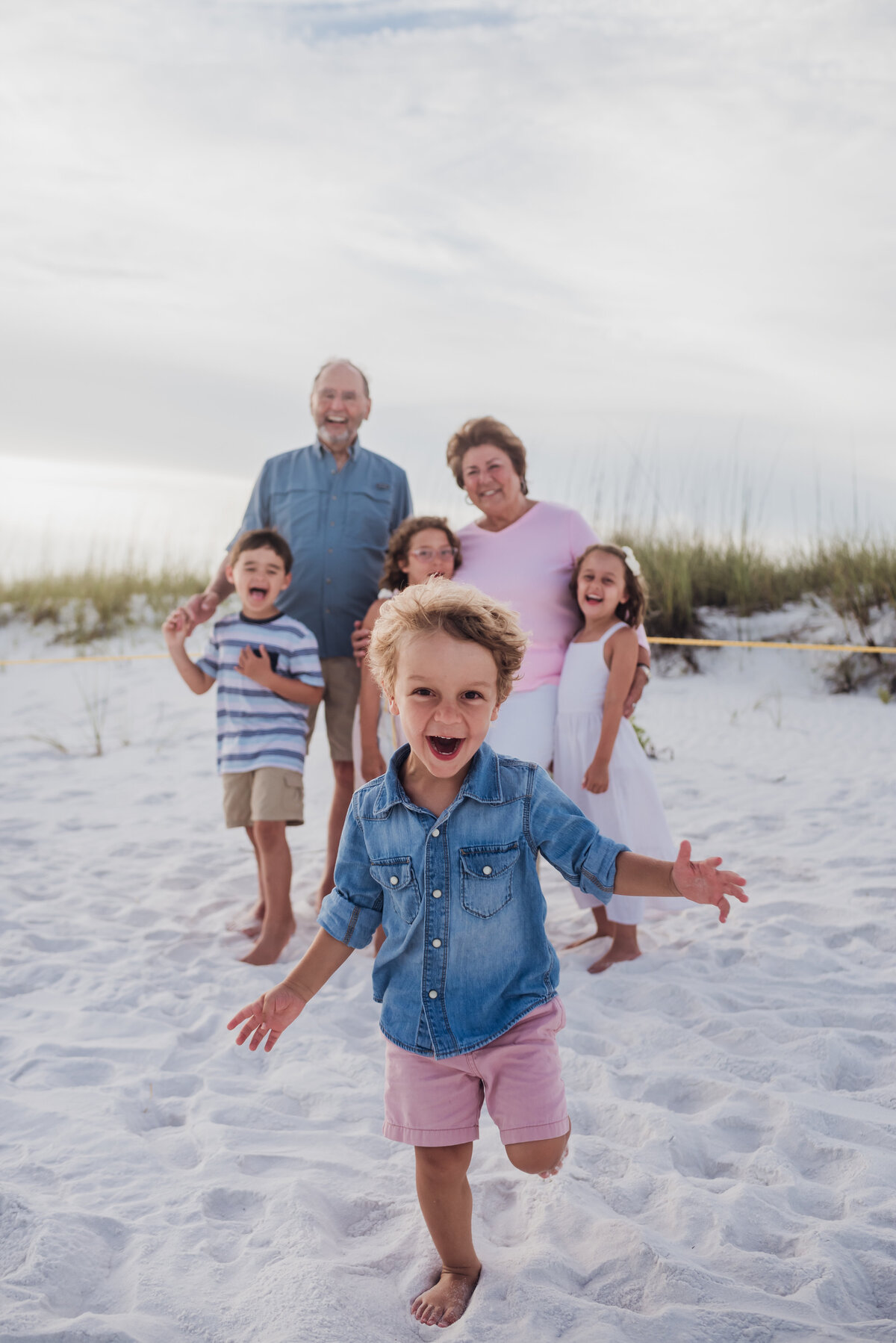 grandparents grandkids on the beach