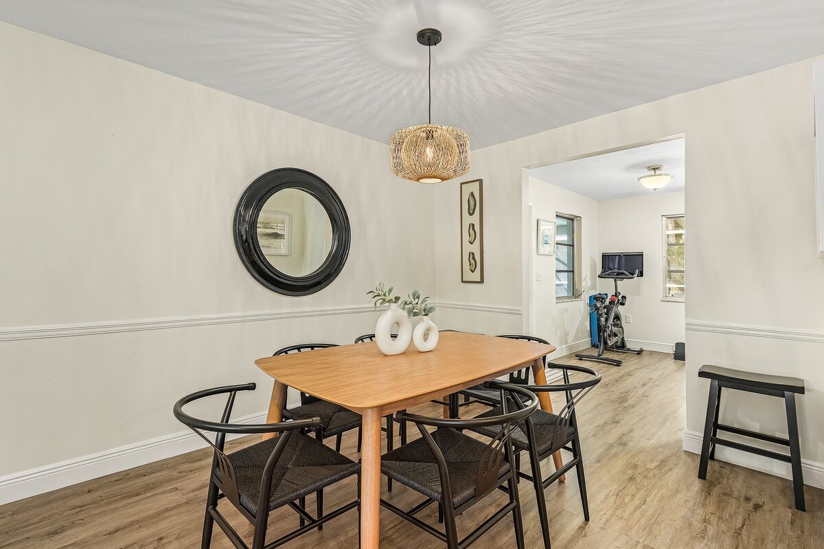 Modern dining room with black accents