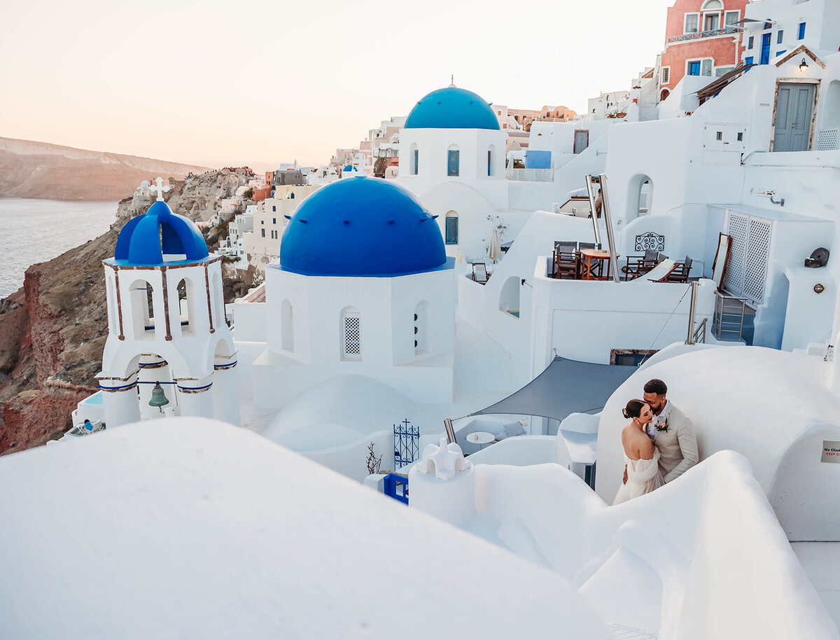 Cliffside elopement overlooking the sea in Oia, Santorini.