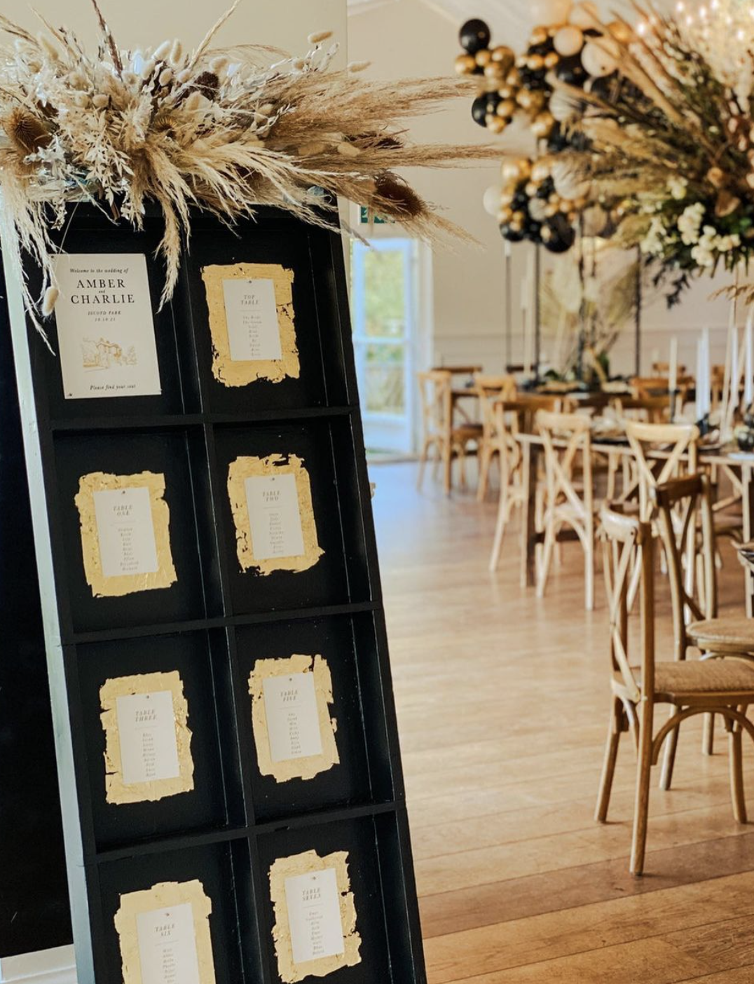 Table plan with gold foil and dried flowers