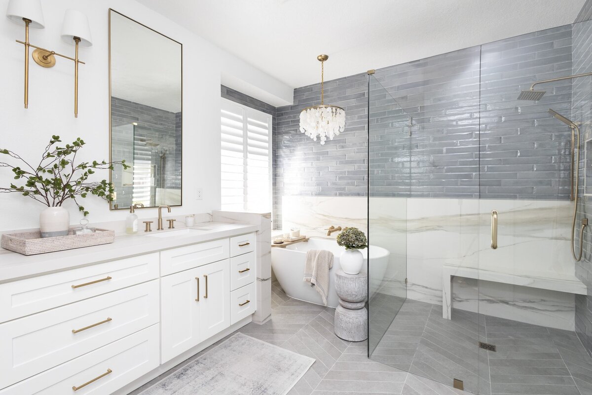 dewine design interiors contemporary coastal primary bathroom with standing tub and large walkin shower