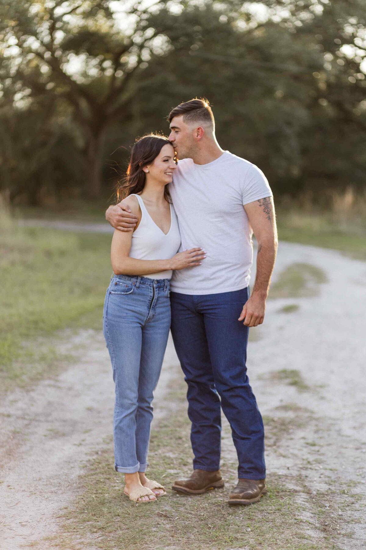 2-man-kisses-fiancee-forehead