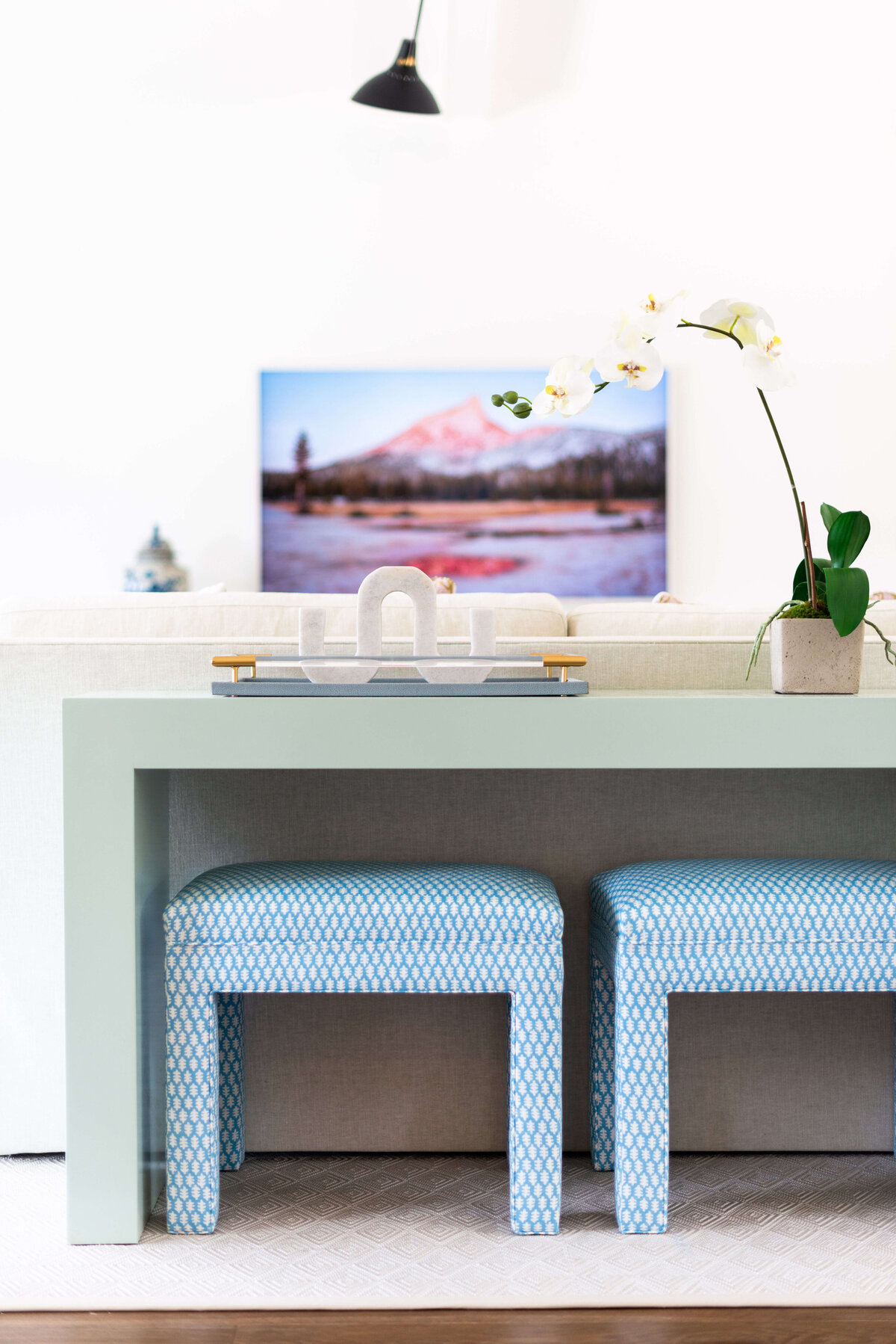 oyster creek studios building belt new build blue stools under green coffee table and landscape photography