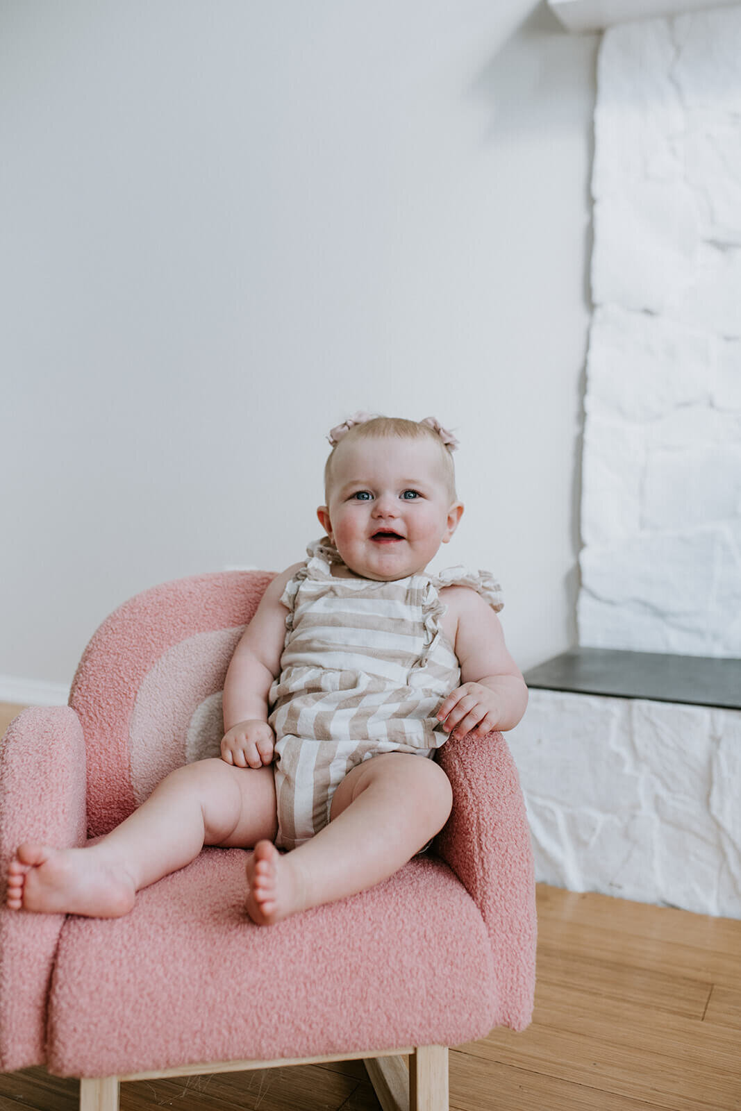 Baby-girl-on-pink-chair