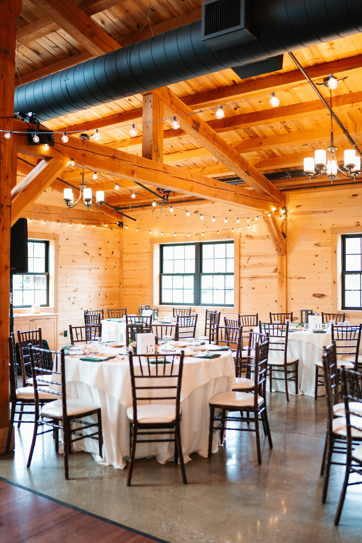 Rustic wedding details with greenery and neutral tones