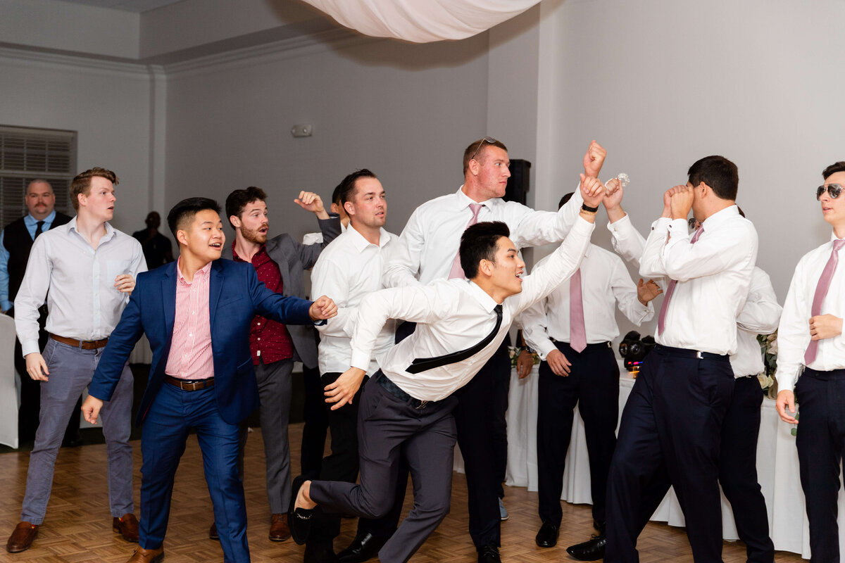 Groomsmen dancing at Stones River Country Club wedding reception