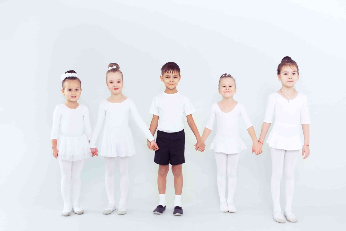Young boys in ballet class learning strength and balance