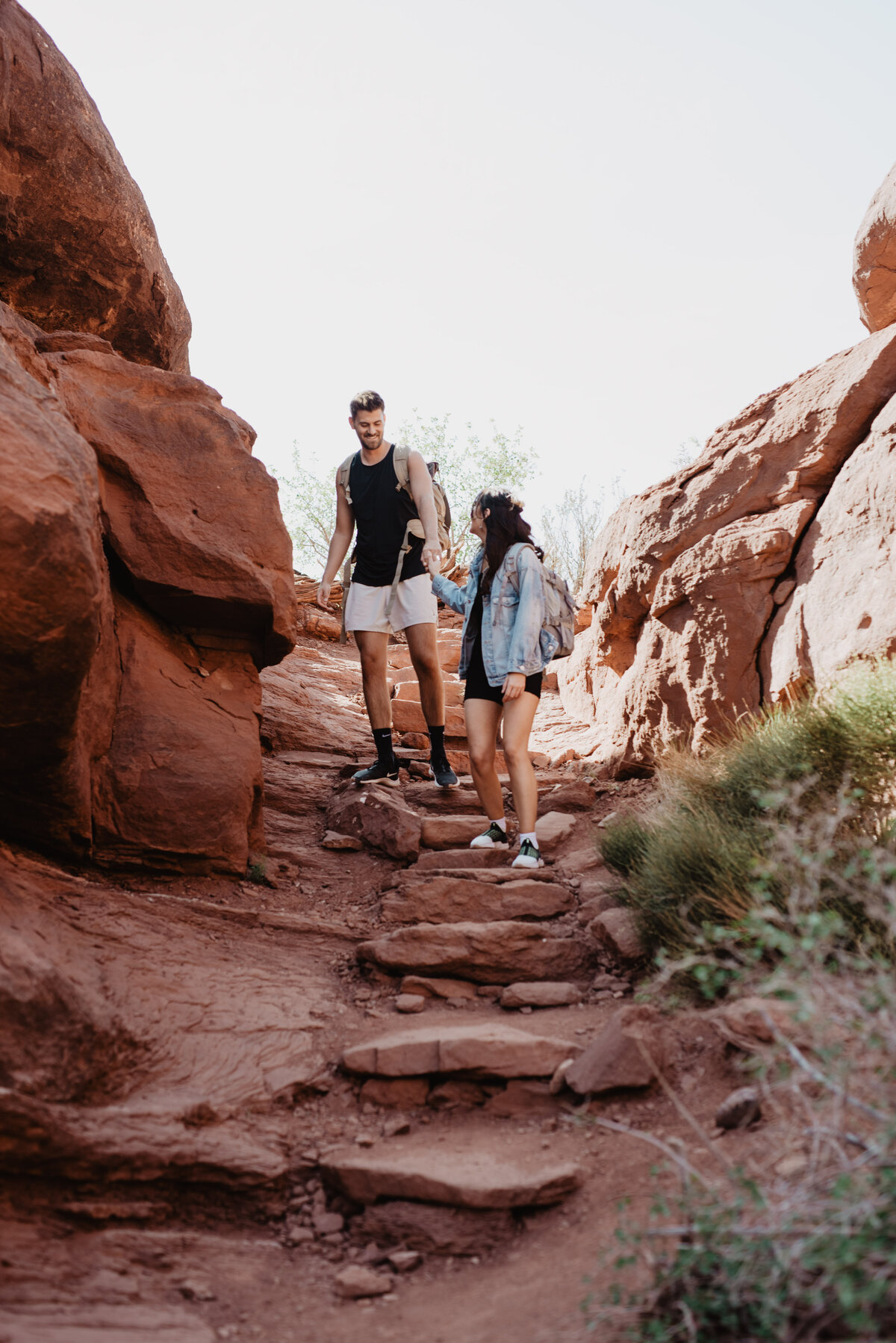 Utah Elopement Photographer captures couple walking together in Moab