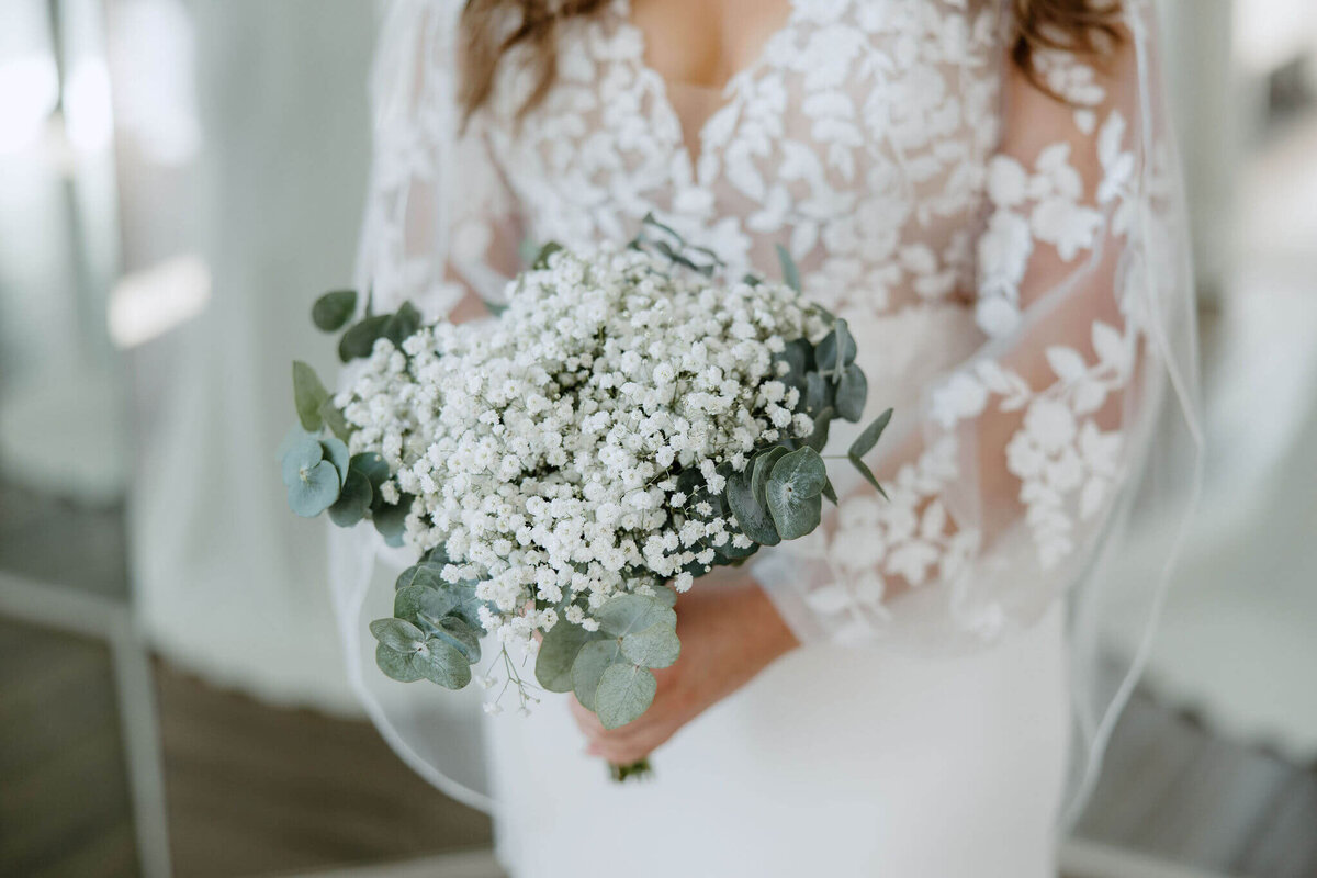 bridal bouquet of baby's breath and fresh eucalyptus