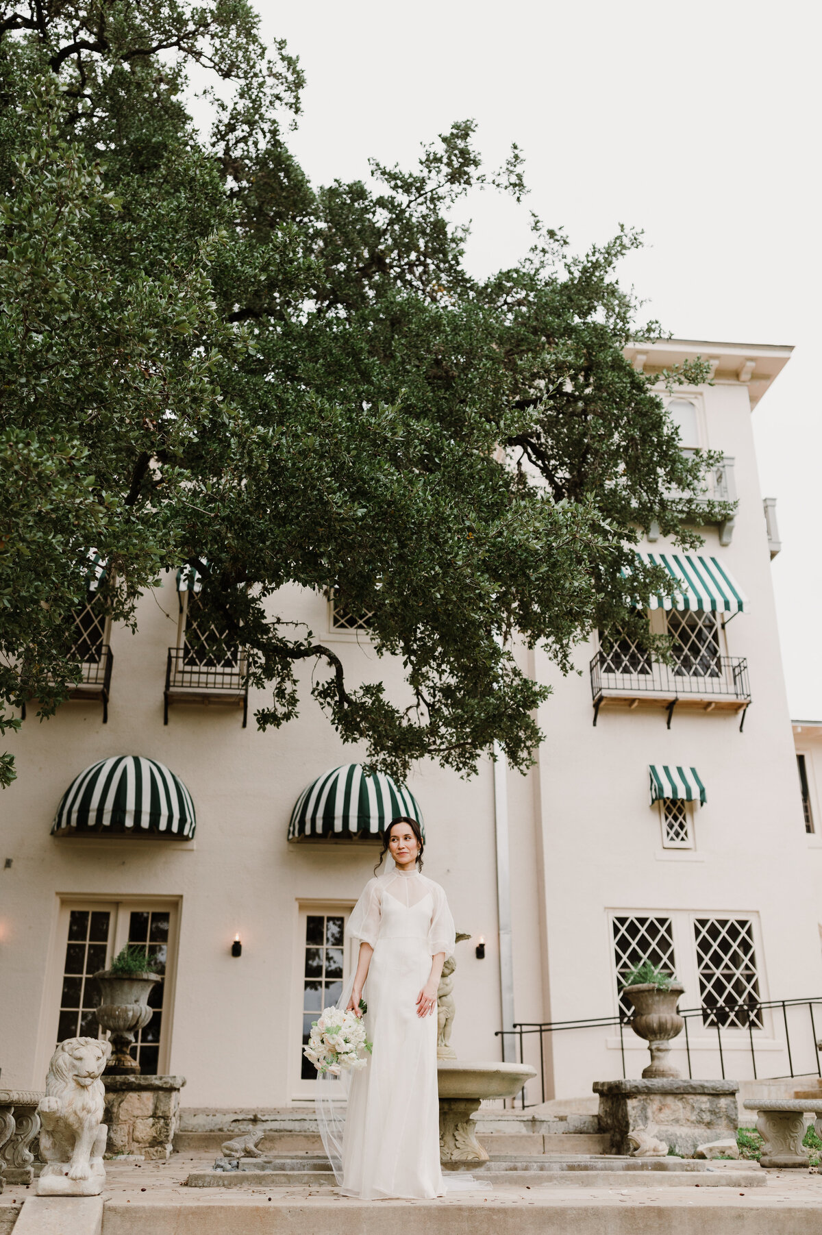 Bride standing outside the Laguna Gloria in Austin