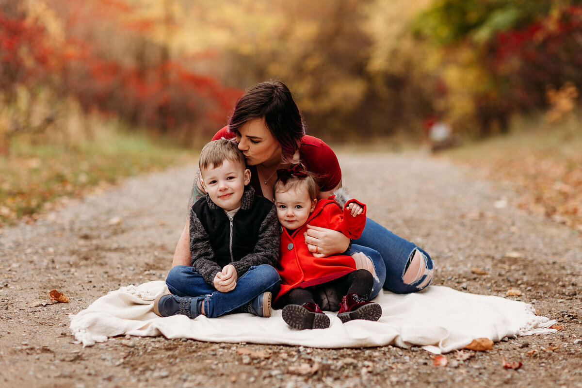 olivia with her 2 babies fall family photoshoot
