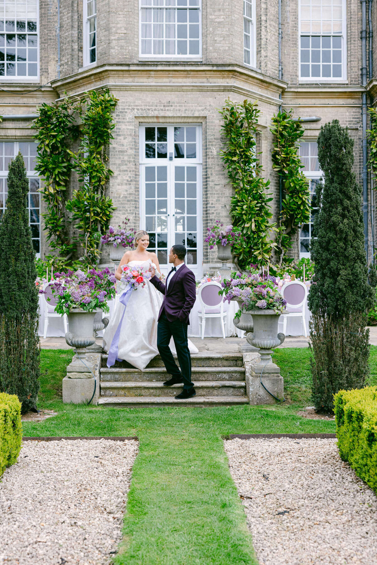 A wedding day photo of the bride and groom at Hedsor House in the Uk