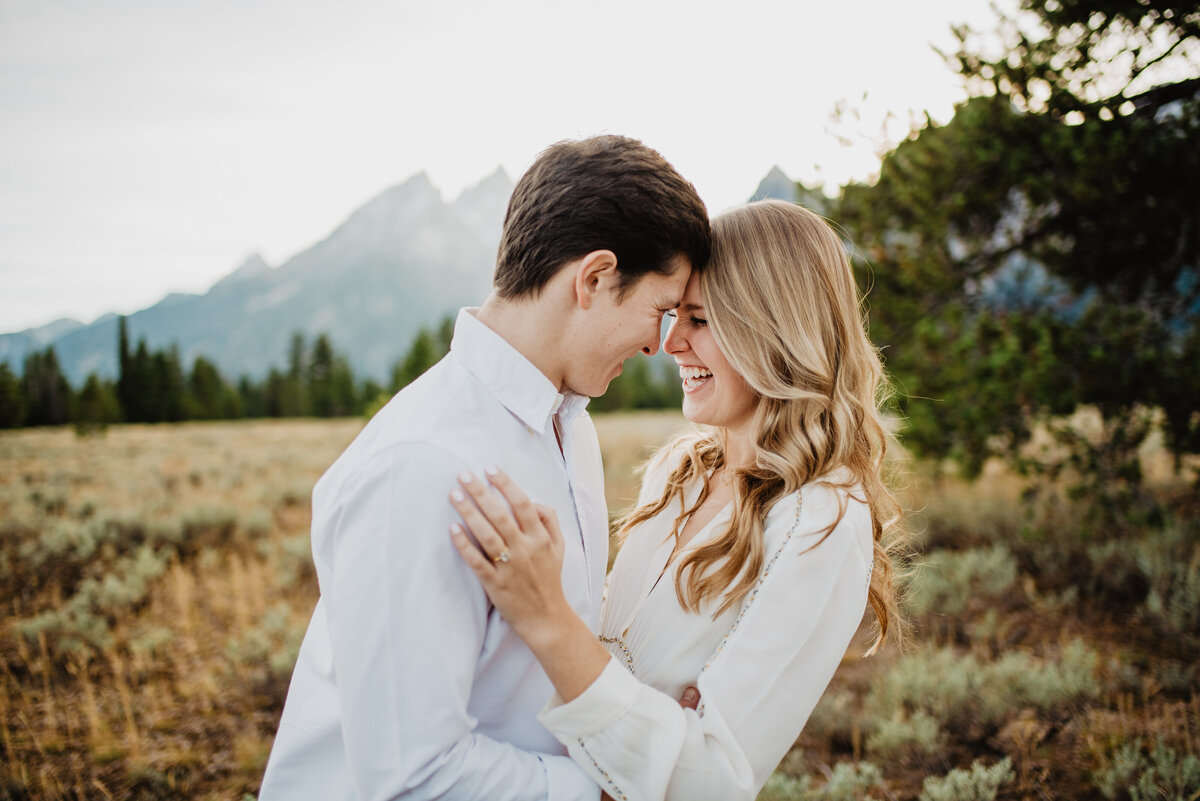 Photographers Jackson Hole capture couple embracing during couple portraits