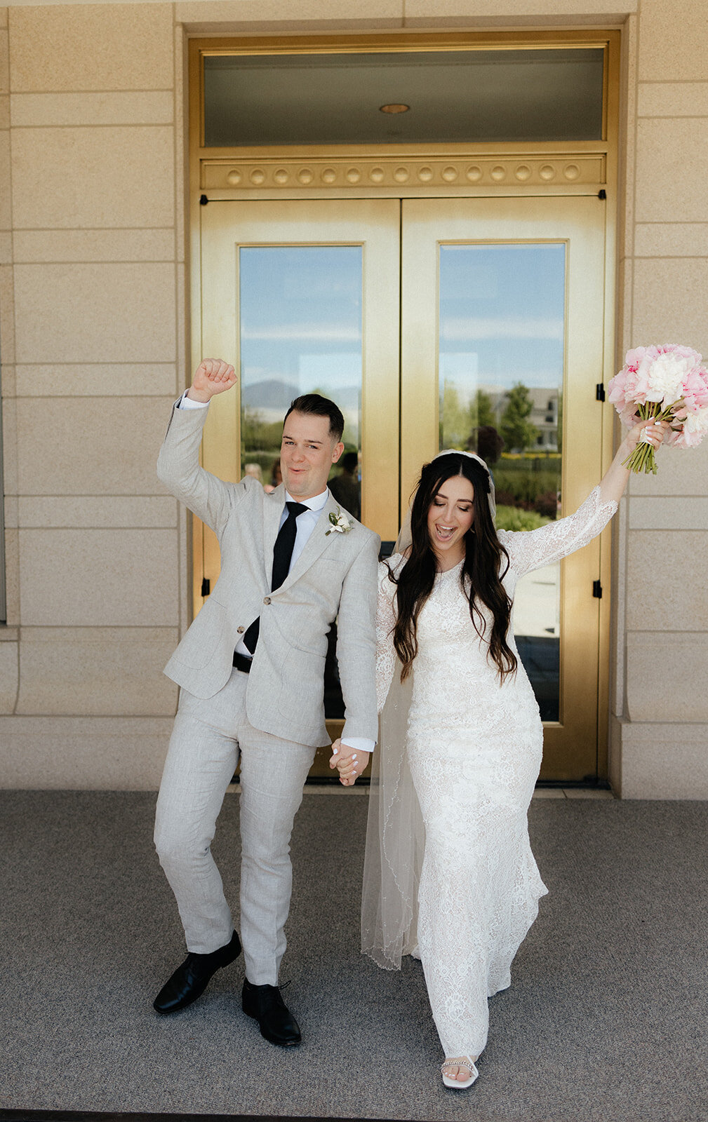 Just married celebrating outside the temple.