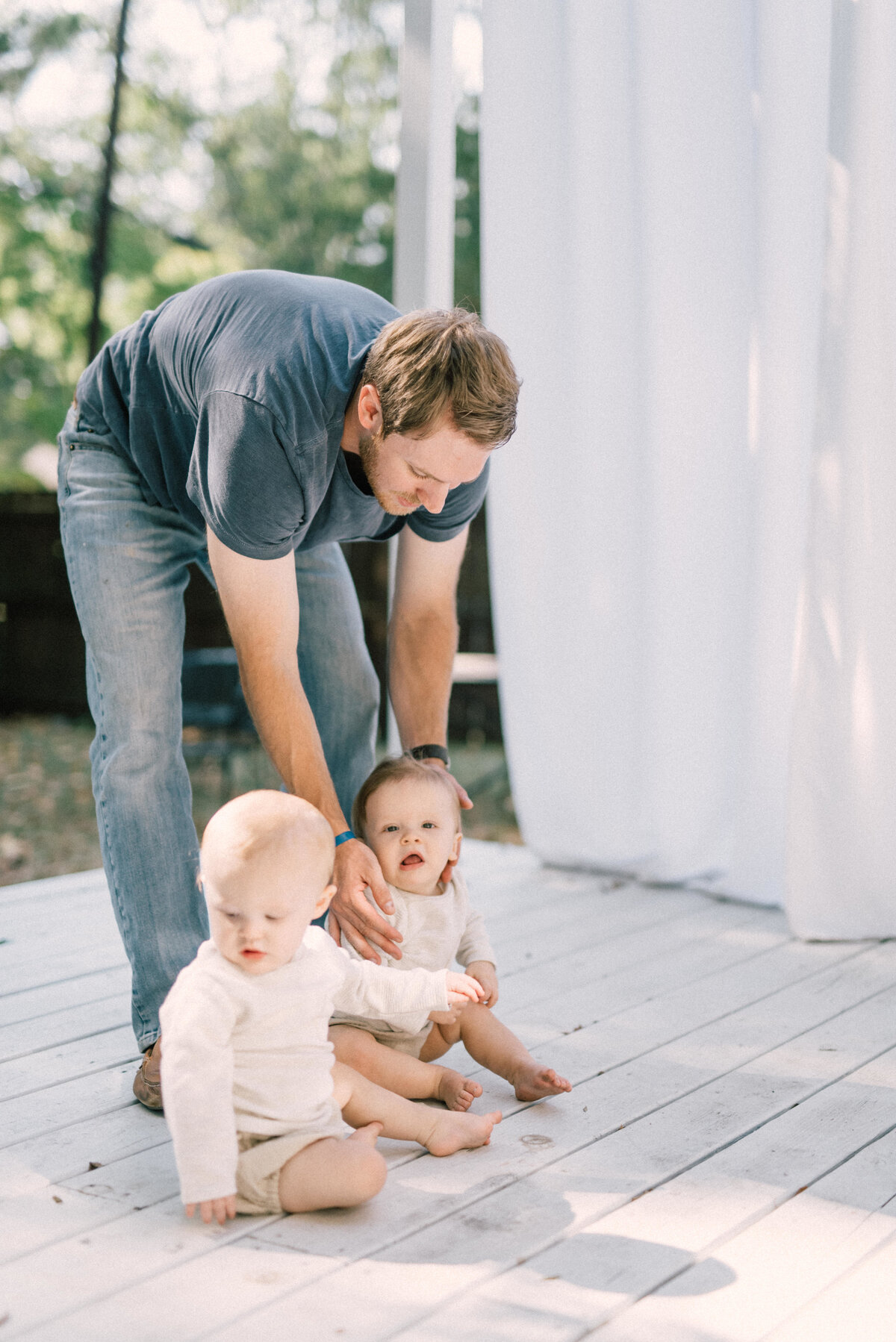 Father and twin boys during their family session in Homewood, AL