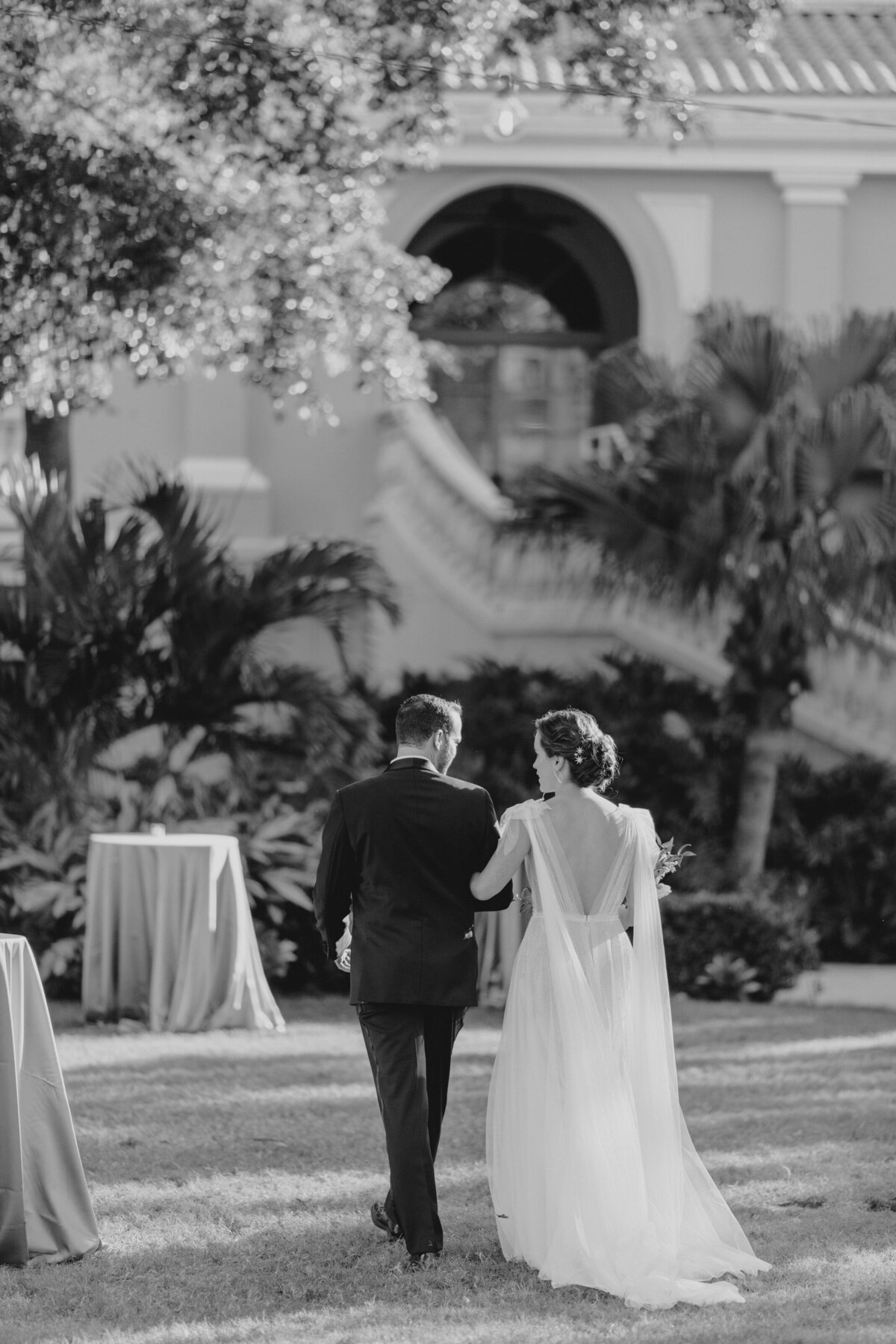 Sarasota Ritz Carlton Wedding bride and groom exit their ceremony