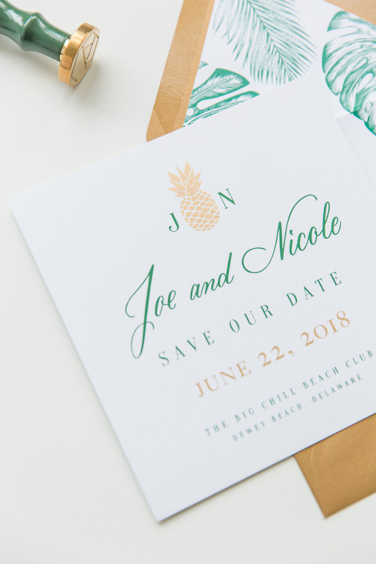 Tropical inspired save the date with custom hand lettering