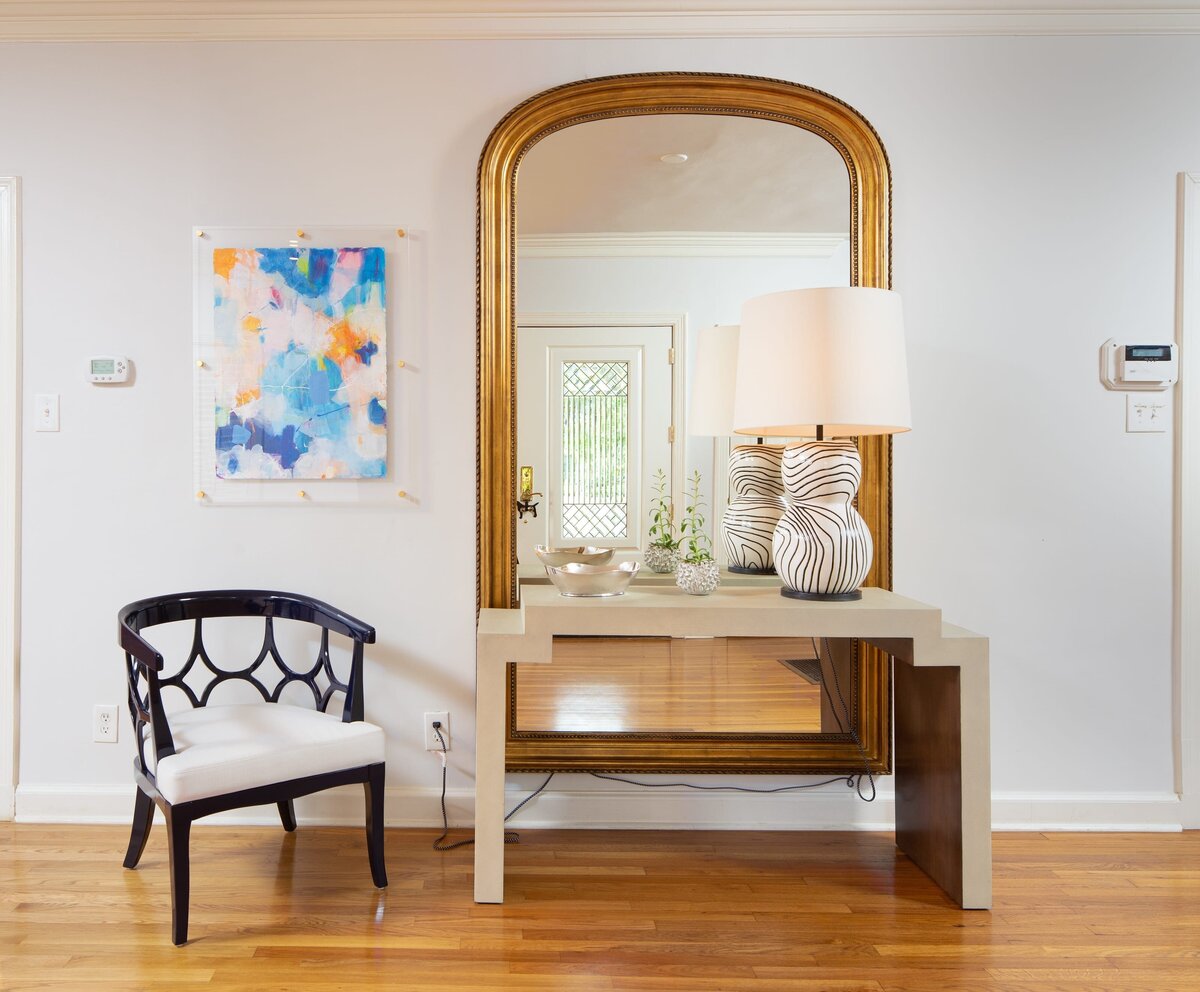 the keeping room interiors alta entry table with gold mirror