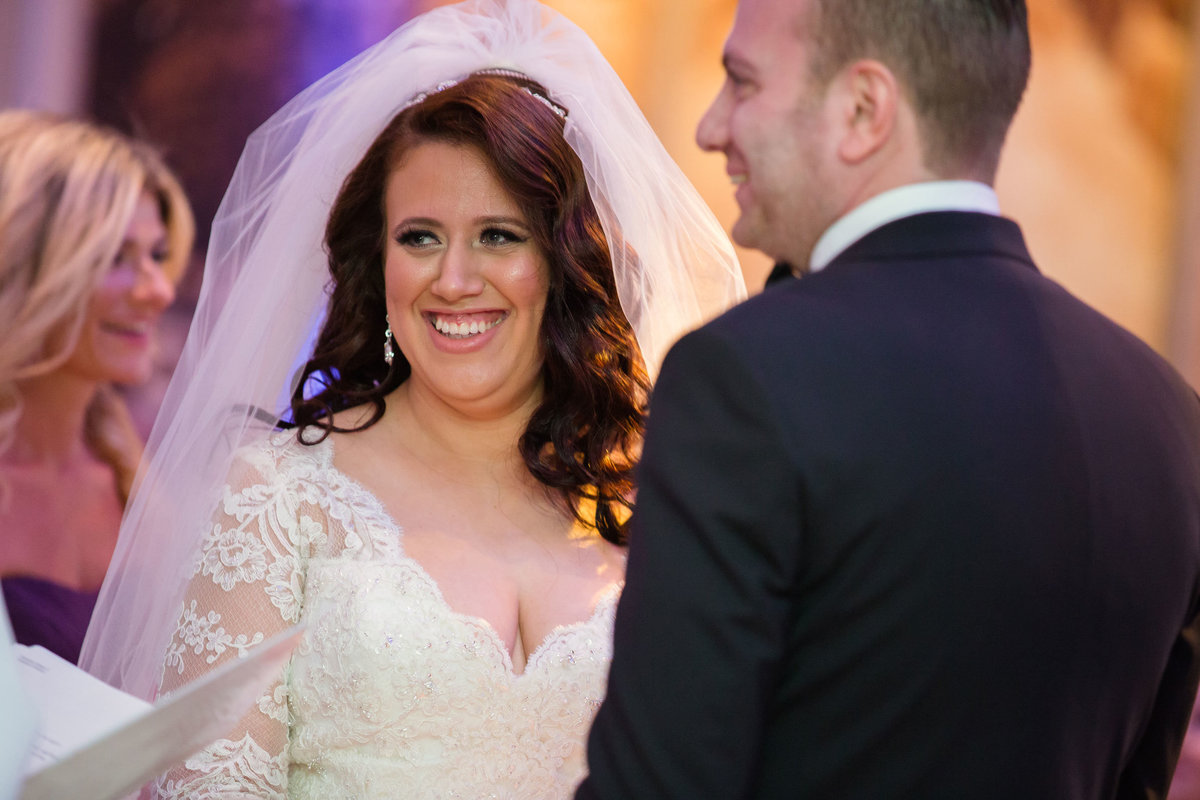 Bride and groom exchanging vows at The Somerley