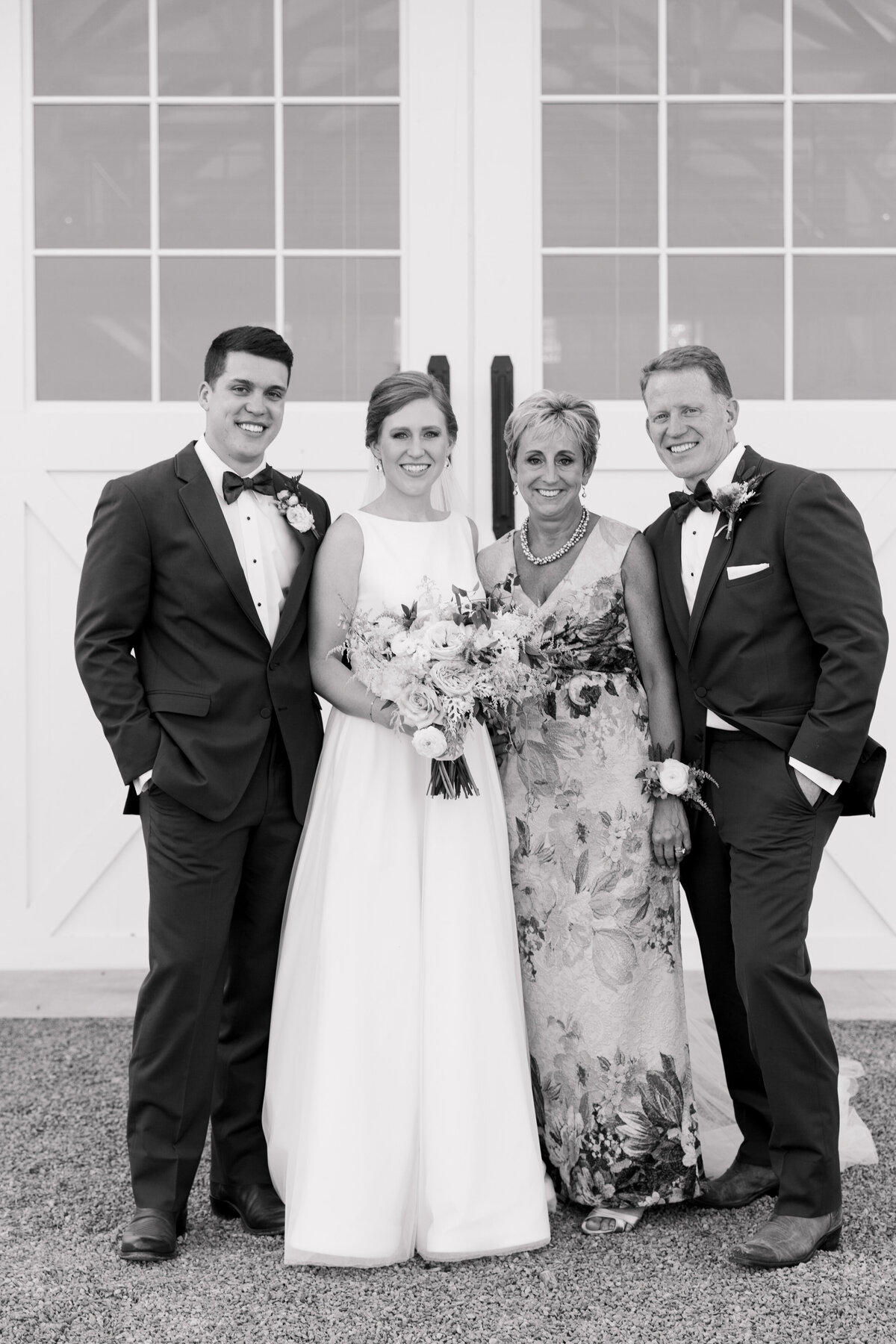 Black and white photo of the Reynolds family at Bethany's wedding